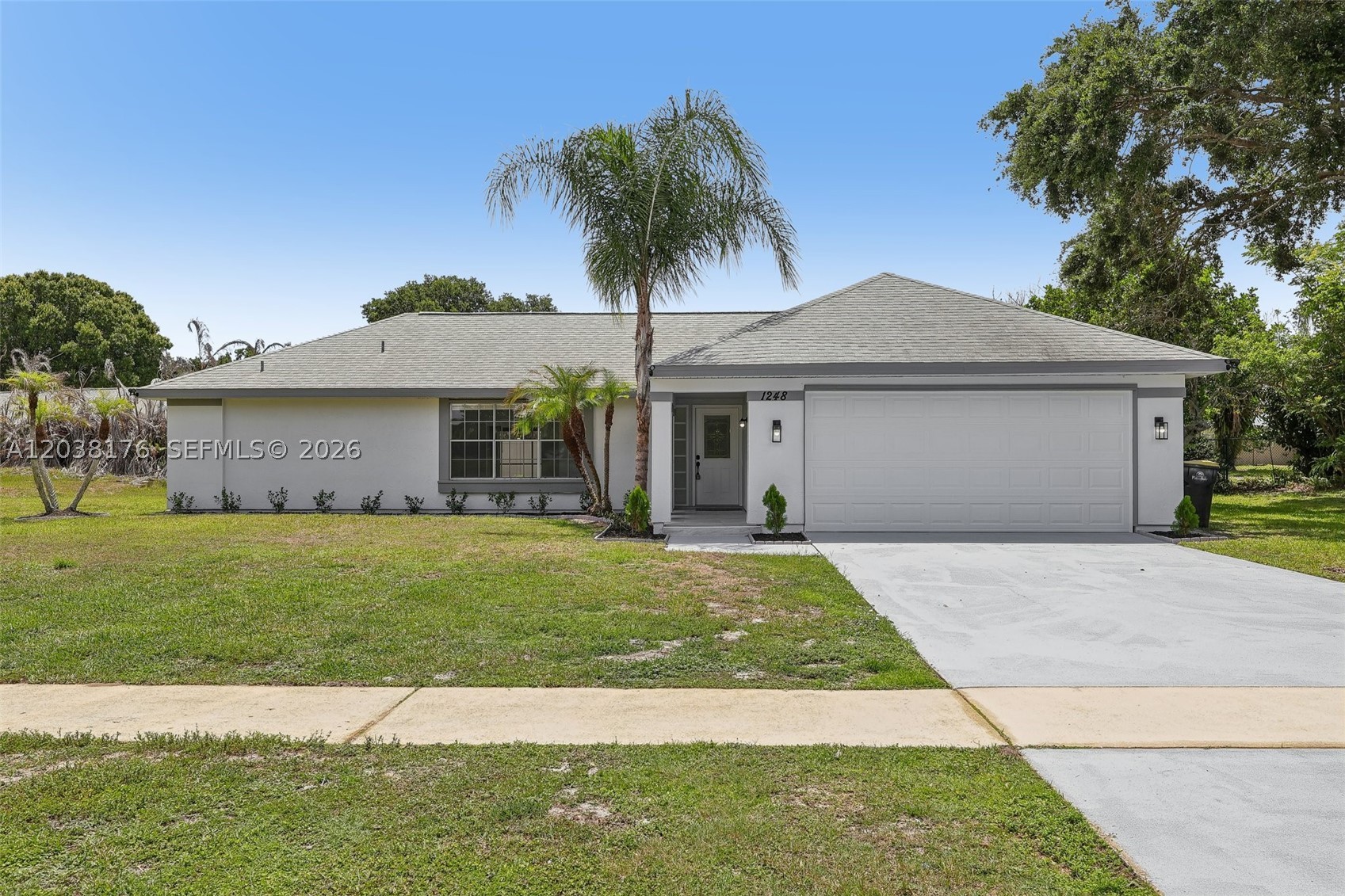 Welcome to this beautifully maintained 5-bedroom, 2-bath home in desirable Palm Bay, Florida! Featuring modern finishes throughout, this spacious residence offers an open and inviting layout perfect for everyday living and entertaining. The well-appointed kitchen comes complete with all appliances, while the included washer and dryer add extra convenience. A 2-car garage provides ample parking and storage space. Step outside to a large screened-in patio, ideal for hosting family gatherings, entertaining guests, or simply relaxing year-round. Conveniently located near Riviera Elementary School, shopping centers, restaurants, and everyday conveniences, with Florida's beautiful beaches just a short drive away. Don't miss this opportunity to own a move-in-ready home in one of Palm Bay's most sought-after locations!
