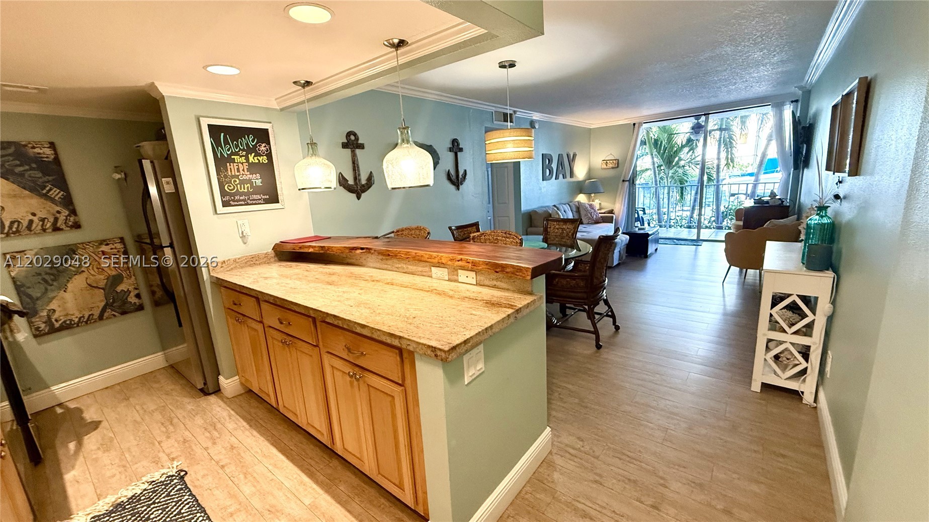 autifully Updated Bayfront Condo in Summer Sea 108 – Tavernier, FL
Enjoy relaxed Florida Keys living in this beautifully remodeled 2-bedroom, 1.5-bath first-floor corner unit located in the sought-after Summer Sea Condominium community in Tavernier. Just steps from the marina and Florida Bay, this private-entry residence offers a peaceful setting with a blend of coastal charm and modern updates.
The thoughtfully designed interior features porcelain wood-look tile flooring, granite countertops, stainless steel appliances, and a unique custom driftwood breakfast bar. The open living and dining area is warm and inviting, complemented by tasteful furnishings and natural light throughout. Both bedrooms offer water views, and the spacious layout comfortably accommodates family and guests alike.
The community has successfully completed its milestone inspection and continues to show pride of ownership with numerous recent improvements, including two new elevators, a new composite dock, newly remodeled poolside bathrooms, and storm rated windows — all completed with no special assessments
Summer Sea is a gated bayfront community known for its resort-style amenities, including a heated and cooled waterfront pool, children’s pool, rooftop sunset deck, marina, fitness room, game room, and sandy shoreline perfect for enjoying the beautiful Florida Keys sunsets.
Conveniently located near restaurants, shopping, fishing, diving, boating, and all the outdoor activities we are famous for.