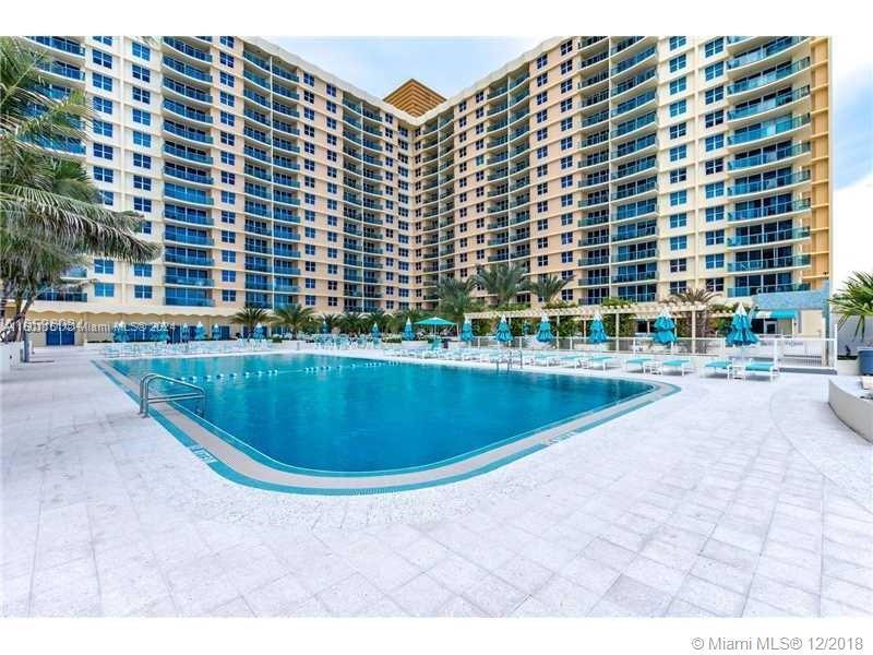 Beautifully decorated studio at a 5-star oceanfront resort building - THE WAVE CONDO. The studio has newer furniture and is ready for you to move in! This unit features tile flooring throughout and has plenty of natural light. The building boasts state of the art amenities such as oceanfront pool deck and jacuzzi areas, complimentary beach service, brand new gym, social room, convenience store, and onsite restaurant, 24 hr security, and valet service. Unit can be rented for a period of 3 months minimum. Has combo washer/dryer inside. All utilities are included in the rent price. Agent/owner.
