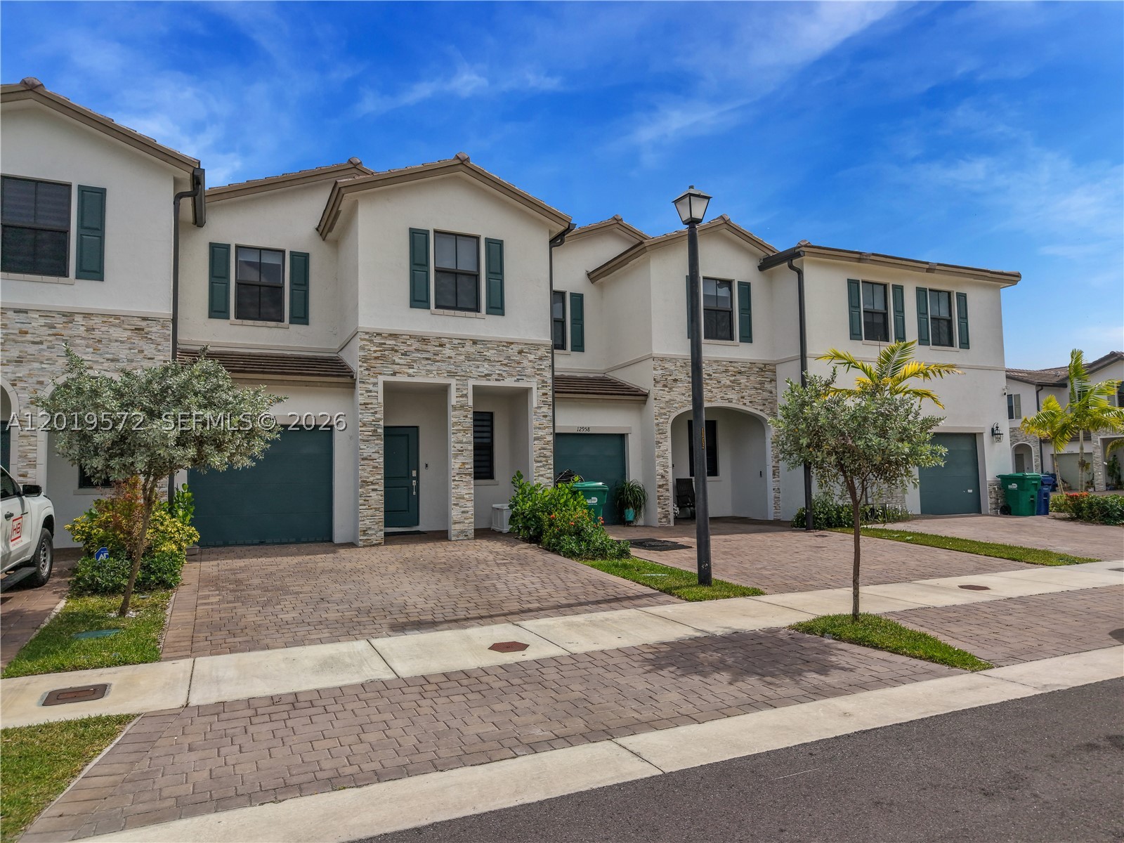 Rare 2024-built 4-bedroom townhouse in Siena Reserve, one of the very few 4-bedroom models currently available in the community. This modern residence offers approximately 1,800+ SF with an open-concept layout, contemporary finishes, and abundant natural light throughout. Spacious living and dining areas flow seamlessly into the modern kitchen, creating an ideal layout for everyday living and entertaining. Well-proportioned bedrooms provide flexibility for families, guests, home office, or investment purposes. Located in a rapidly growing area of South Miami-Dade with convenient access to major highways, shopping, dining, schools, and everyday conveniences. Limited comparable 4-bedroom inventory within the community makes this a competitively positioned opportunity in today’s market. Easy to show.