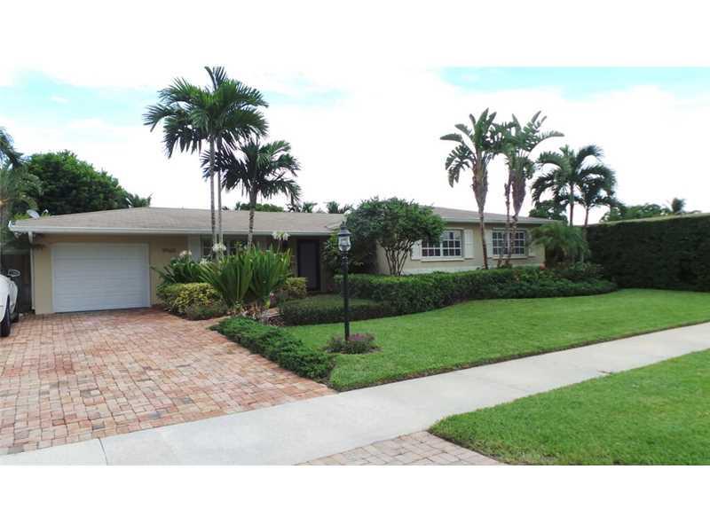 Completely updated pool home in an excellent neighborhood. Garage has been converted to an office/den, and a separate laundry room.  Impact door throughout.  Kitchen is new with stainless steel appliances real wood cabinets and quartz countertops. Bathroo ms have been tastefully updated by this interior designer/owner.  No repairs or updates are necessary in this home.  The property is located within Kendale with easy access to major highways but on a quiet street.  Easy to show call now!