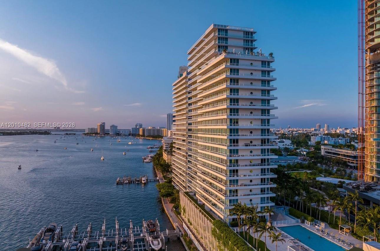 Residence 1203 at the iconic Bentley Bay offers a refined waterfront lifestyle in one of Miami Beach’s most desirable bayfront enclaves. This thoughtfully designed residence features a bright, open layout with floor-to-ceiling windows showcasing sweeping Biscayne Bay views. Spacious living and dining areas flow seamlessly to a private balcony, perfect for enjoying breathtaking sunsets.
A sleek modern kitchen features contemporary cabinetry and premium appliances, while the spacious primary suite offers a serene retreat with generous closet space. The well-appointed bath is generously sized with a separate tub and shower.
Residents of Bentley Bay enjoy full-service amenities including a bayfront pool, fitness center, valet, and 24-hour concierge. Ideally located just minutes from Sunset Harbour, Lincoln Road, and the beach, this residence offers both tranquility and access to Miami Beach’s top dining, shopping, and lifestyle destinations.