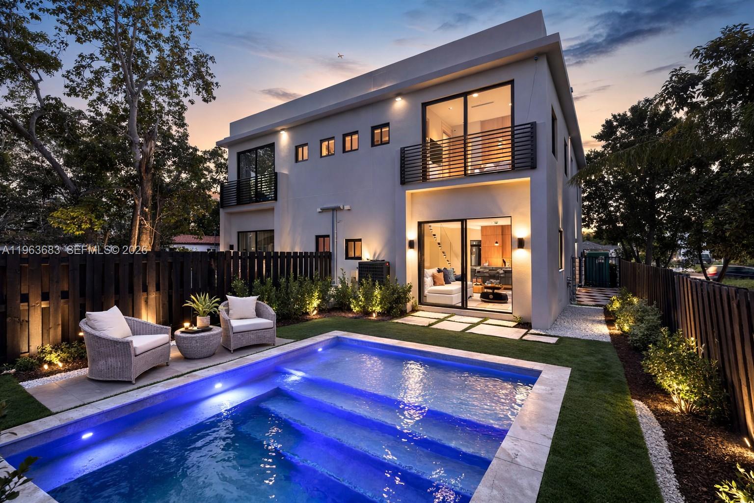 Just steps from the iconic Miami Design District, The Villa District Residences sets a new standard for contemporary luxury living. This newly constructed architectural showpiece features 3 bedrooms plus a den with 3.5 bathrooms, designed for those who value distinction & refined craftsmanship. An open-concept layout is defined by soaring ceilings and dramatic volumes, creating a seamless indoor–outdoor flow bathed in natural light. The bespoke chef’s kitchen is outfitted with premium Fisher & Paykel appliances, custom-crafted cabinetry, and sleek designer finishes that elevate both form & function. The primary suite serves as a private sanctuary, featuring hand-selected marble in the spa-inspired bath — an artful expression of elegance and exclusivity. Hand-applied Chukum finishes flow throughout the residence, introducing rich texture rarely seen in new construction. Custom-designed closets & thoughtfully integrated storage provide functionality at every turn. Step outside to your private pool, a secluded oasis in the heart of the city. A private garage and refined architectural detailing complete this extraordinary home. Buyers also have the opportunity to personalize the residence with a curated selection of upgrades. From discreet drop-down televisions and fully integrated low-voltage smart home packages to bespoke enhancements tailored to your lifestyle. A rare opportunity to refine & elevate details to create a home that is distinctly yours. Experience in person today.