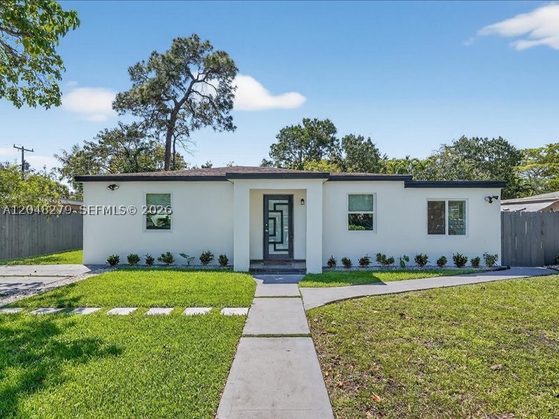 Don't miss this exceptional opportunity to own a beautifully renovated home in the heart of North Miami! Per the appraisal, the property offers 1,550 sq. ft. of living area on a large lot with endless potential.
The main home features 2 bedrooms and 1 bathroom, plus a private 1-bedroom, 1-bath guest/in-law suite—ideal for extended family, guests, or rental income.
The bright, open interior showcases luxury vinyl flooring, recessed LED lighting, impact windows and doors, glass interior doors, and an updated bathroom. Upgraded electrical and plumbing systems provide added value and peace of mind.
The modern kitchen features a spacious quartz peninsula, ample cabinetry, contemporary finishes, and brand-new appliances.
Outside, enjoy a freshly painted exterior, new landscaping, lush lawns, a welcoming front porch, a large deck, concrete driveway, updated lighting, storage shed, mature avocado and mango trees, and a newer roof.
The oversized backyard offers plenty of room for a boat or RV, with space to add a pool.
Conveniently located in a family-friendly neighborhood just one block from US-1 and Biscayne Boulevard , this home provides convenient access to shopping, dining, parks, schools, and major roadways. Whether you're searching for your first home or a smart investment with income potential, this property is an opportunity you won't want to miss.