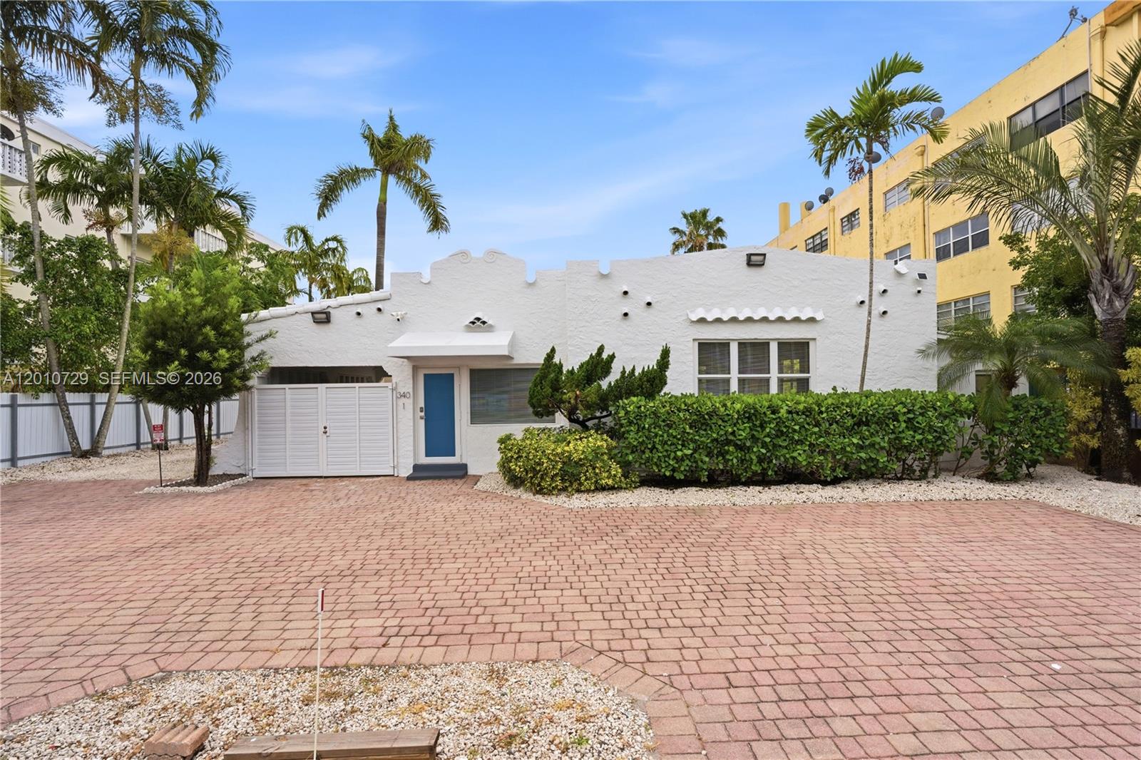 Nestled just off 125th Street near North Miami’s downtown, this multifamily-zoned property (allowing 2 to 9 units) sits on a generous 11,250-square-foot lot. The fully remodeled main house features three bedrooms, two baths, impact windows, abundant light, and modern updates, including PVC plumbing and a gas-line kitchen. A carport and ample parking add convenience. Beyond the main home, three efficiencies and a storage unit offer immediate income potential, making it perfect for living while earning. Plus, the property has completed its 40-year recertification—a significant milestone. Whether you keep it as is or redevelop for more units, this property offers rare flexibility and value.