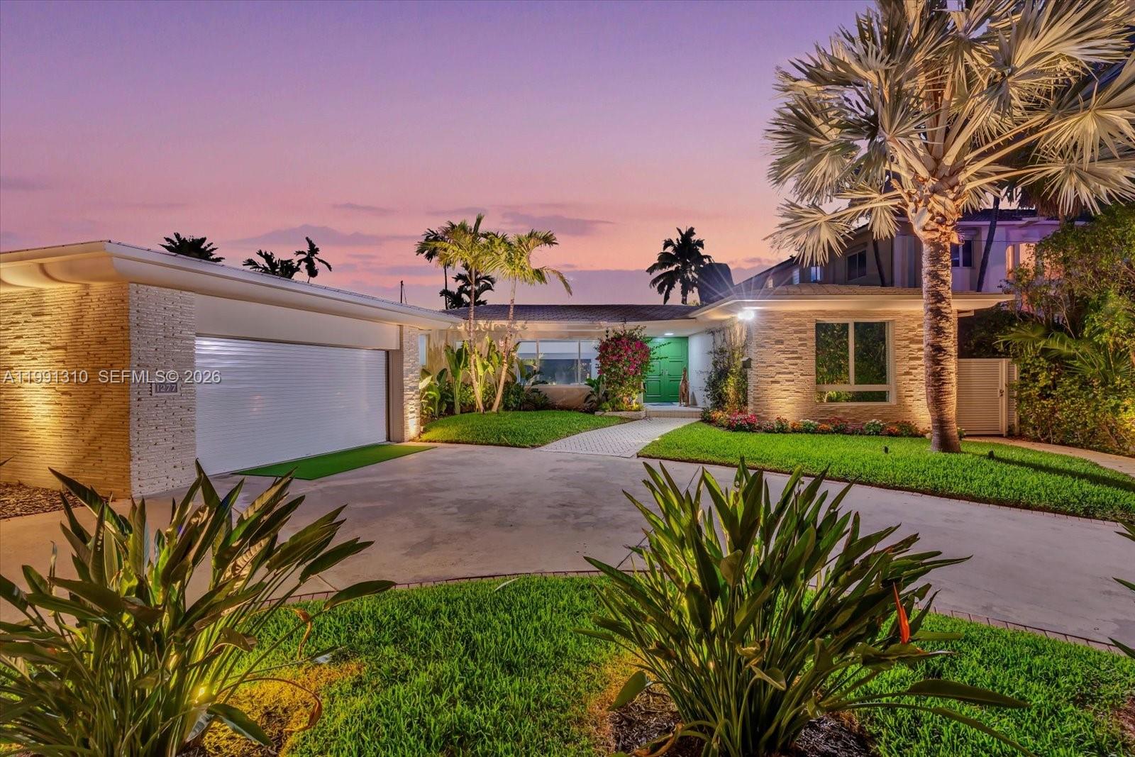 Waterfront retreat on secluded Biscaya Island in Surfside!

This beautifully newly renovated residence, designed by renowned architect Gilbert Fein, offers prime waterfront with unobstructed access to the Intracoastal and open ocean—no fixed bridges. A rare opportunity for true boaters seeking both privacy and convenience.

Designed for effortless indoor-outdoor living, the home features expansive open spaces filled with natural light, a sleek modern kitchen, and multiple living areas ideal for entertaining.

Set within a very private and secure double-gated enclave, the home offers an unparalleled sense of exclusivity and peace of mind.

The backyard is a private oasis, complete with a resort-style pool, oversized wood deck, lush landscaping, and tranquil water views. Dock your boat just steps from your home and enjoy the ultimate South Florida lifestyle.

Minutes from Bal Harbour Shops, the beach, and world-class dining, this is one of the most unique waterfront offerings in the area.