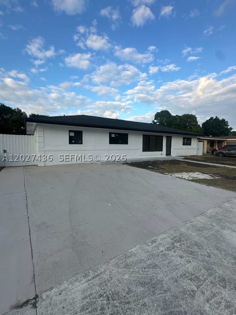 Discover this beautifully remodeled Miami Gardens residence featuring 4 bedrooms and 4 bathrooms, offering a perfect blend of quality, design, and comfort. Although not classified as New Construction, the home has undergone a complete, full-scale renovation, entirely done with permits, providing peace of mind and long-term value. Major upgrades include new plumbing with permit, new electrical system with permit, new permitted roofing, and a new air-conditioning system installed with permit. Every improvement was completed according to current county standards, ensuring safety, efficiency, and durability. Inside, the home showcases a modern open-concept layout with stylish finishes and bright, spacious living areas. The fully renovated kitchen features contemporary cabinetry, quality countertops, and updated appliances. All four bedrooms offer comfort and privacy, while the four bathrooms display sophisticated design and carefully selected materials. The exterior provides a generous backyard with excellent potential for outdoor living, entertainment, or future enhancements. Located in a well-established residential neighborhood close to schools, shopping, and major highways, this property stands out as a unique opportunity: a thoroughly renovated home with every upgrade fully permitted and ready to move in from day one.
