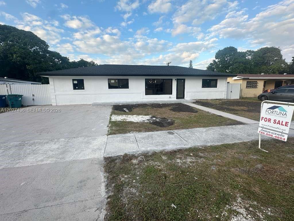 Discover this beautifully remodeled Miami Gardens residence featuring 4 bedrooms and 4 bathrooms, offering a perfect blend of quality, design, and comfort. Although not classified as New Construction, the home has undergone a complete, full-scale renovation, entirely done with permits, providing peace of mind and long-term value. Major upgrades include new plumbing with permit, new electrical system with permit, new permitted roofing, and a new air-conditioning system installed with permit. Every improvement was completed according to current county standards, ensuring safety, efficiency, and durability. Inside, the home showcases a modern open-concept layout with stylish finishes and bright, spacious living areas. The fully renovated kitchen features contemporary cabinetry, quality countertops, and updated appliances. All four bedrooms offer comfort and privacy, while the four bathrooms display sophisticated design and carefully selected materials. The exterior provides a generous backyard with excellent potential for outdoor living, entertainment, or future enhancements. Located in a well-established residential neighborhood close to schools, shopping, and major highways, this property stands out as a unique opportunity: a thoroughly renovated home with every upgrade fully permitted and ready to move in from day one.