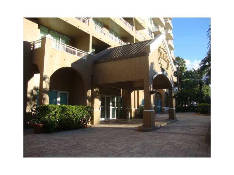 COZY CONDO 2/2 BRAND NEW WOOD FLOORS! IMPACT WINDOWS WASHERS AND DRYER, SAUNA, FITNESS CENTER. MEETING ROOM. SECURITY KEY. PRIVATE COVERED ASSIGNED PARKING. TWO BLOCKS FROM MIRACLE MILE, COCONUT GROVE, 24 HOUR SECURITY ACCES TO BUILDING, COZY CORNER UNIT,  FRESH PAINTED. NO PETS PLEASE.