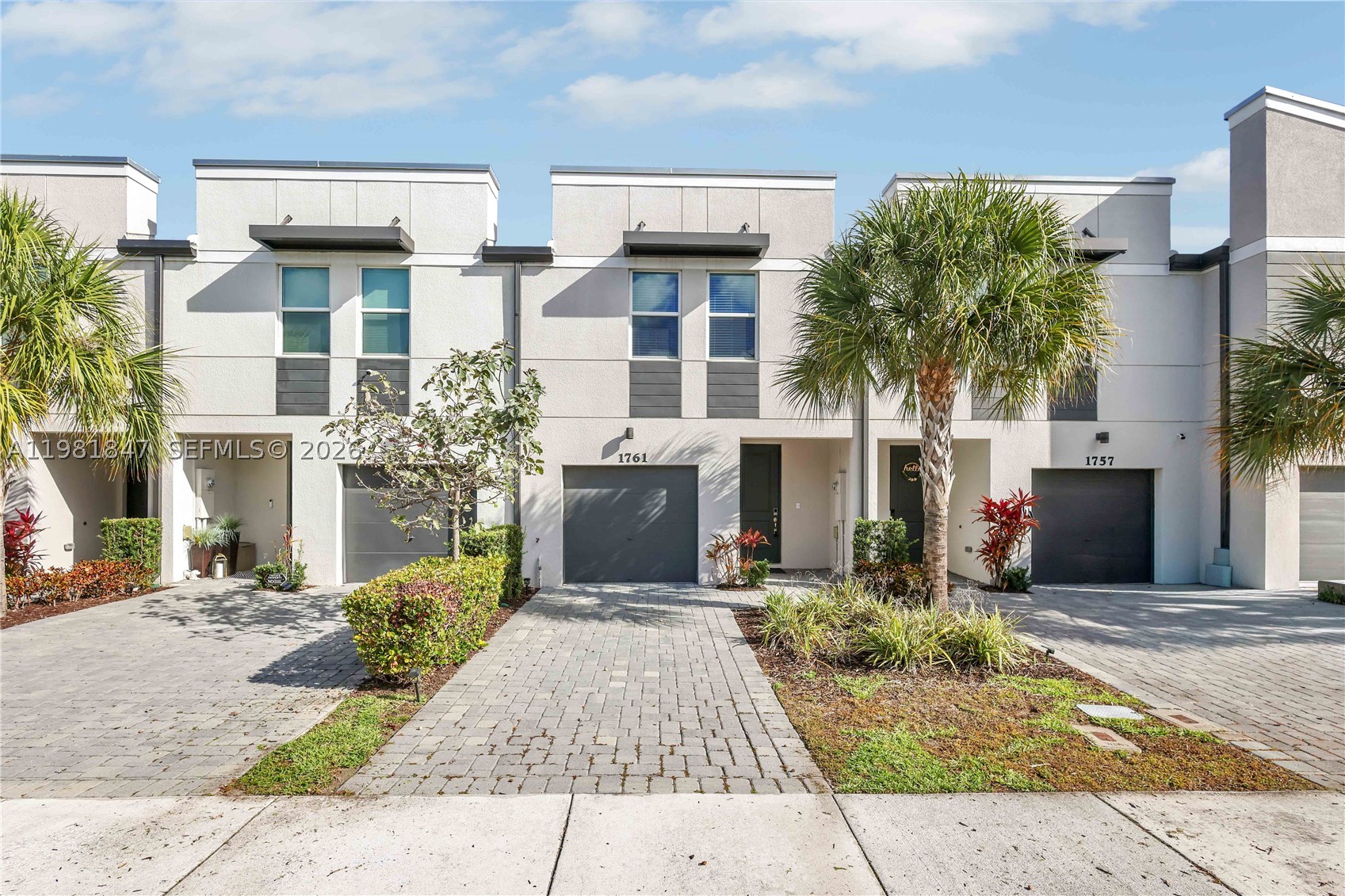 LAKE VIEW!!! Welcome to this beautifully well maintained 3 Bedroom, 2.5 Bathroom townhome built in 2022, offering modern comfort and a functional layout in a desirable gated community. This home features hurricane impact windows and doors, providing added safety, energy efficiency, and peace of mind. The open concept first floor features tile flooring throughout the main living areas, creating a bright and inviting space perfect for both everyday living and entertaining. The kitchen is equipped with newer stainless steel appliances, modern cabinetry, and ample counter space. Upstairs, you’ll find comfortable carpet flooring throughout the bedrooms along with a versatile loft area that can easily serve as a home office, kids’ play area, or additional lounge space. The spacious primary suite offers privacy and comfort with its own bathroom and generous walk-in closet space. Laundry room is located upstairs for convenience. Enjoy peaceful lake views from the home, creating a relaxing atmosphere to unwind after a long day. Residents also benefit from community amenities including a community pool, all within the security and convenience of a gated neighborhood. This newer townhome combines modern construction, flexible living space, and great community amenities, making it an excellent place to call home. LOW HOA!!!
