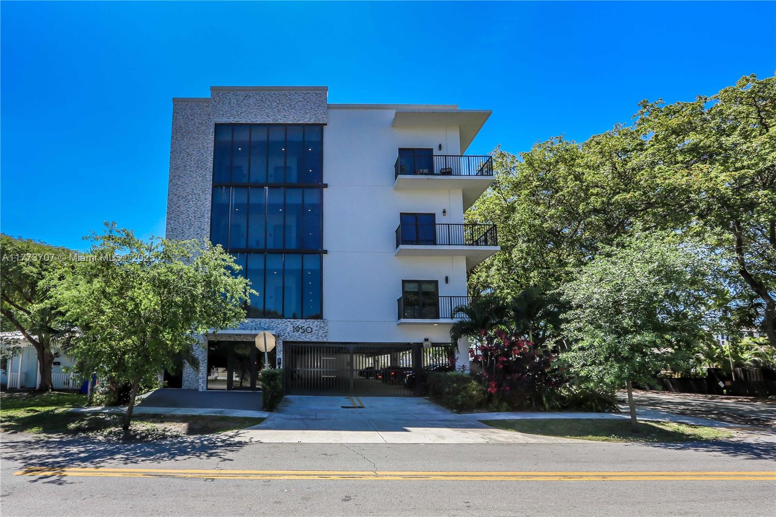 Fletcher Apartments, nestled in the heart of Hollywood, Florida, at 1950 Fletcher Street, is a modern residential building consisting of 18 units completed in 2021. The property encompasses 13,761 net rentable square feet within a 19,433 gross square foot structure, set on a 21-acre lot. Offering a well-balanced mix of residences, Fletcher Apartments includes (9) 1-Bed/1-Bath units averaging 597 square feet, and (9) 2-Bed/2-Bath units averaging 932 square feet, making it an ideal home for professionals, families, and those seeking a sophisticated lifestyle in a prime location.