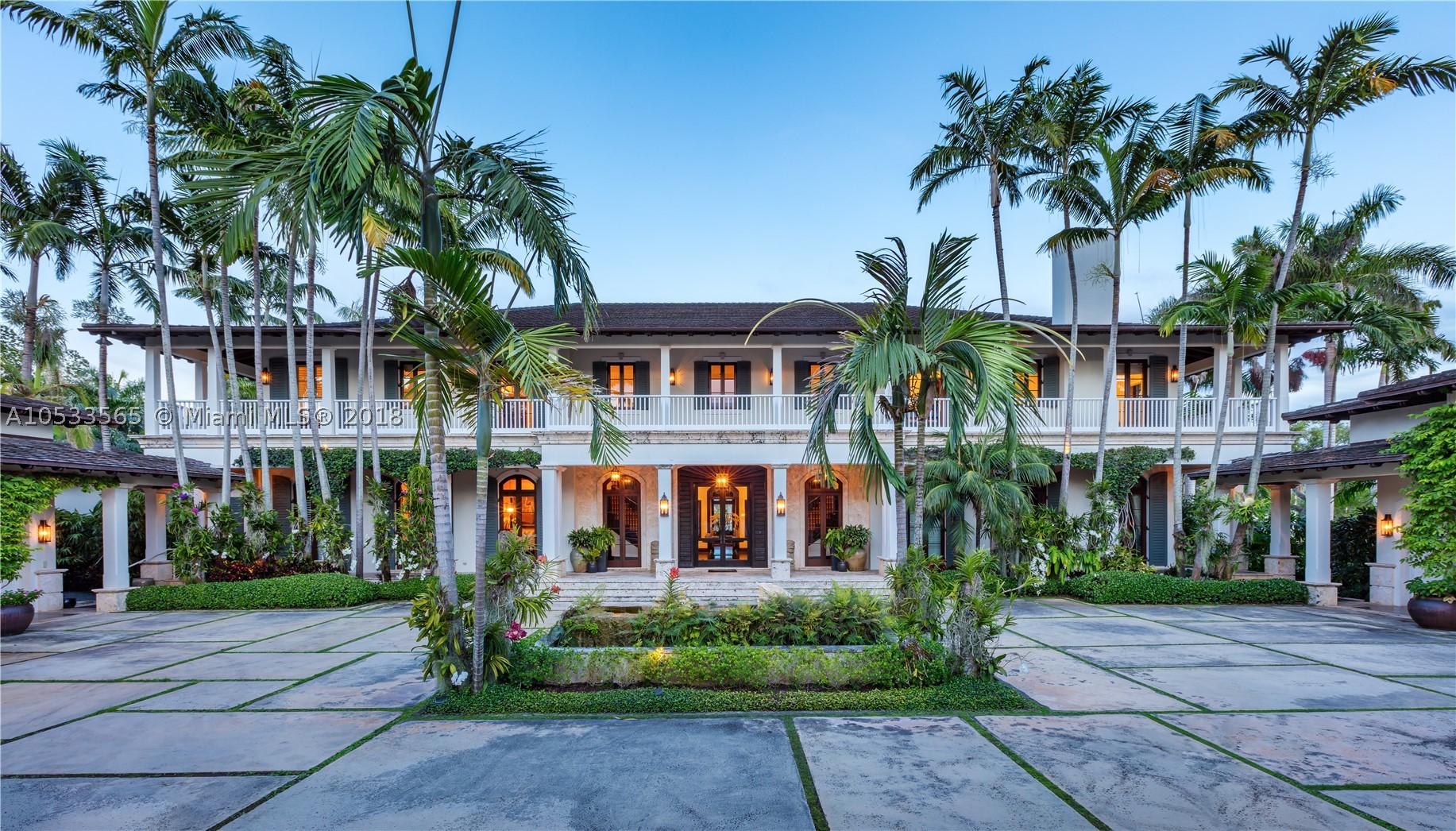 Lush, tropical landscaping is the essence of El Palmar, a truly unique residence located in the heart of Coral Gables on one of its largest waterfront properties. A majestic, storybook setting crafted by renowned architect Cesar Molina and landscape artist Raymond Jungles. El Palmar is showcased as art, with native species, a stunning koi pond and coral rock pathways harvested on site. An open family room, a quiet library, a 2,000-bottle wine cellar, an expansive kitchen, pub-style bar, living room with fireplace, a private service wing and an elevator.  Impressive summer kitchen, large pool and boathouse offer the perfect environment to unwind. A private and custom 110’x36’ boat inlet keeps water-crafts & allows for uninterrupted water views - a total of 335’+/- of water frontage.