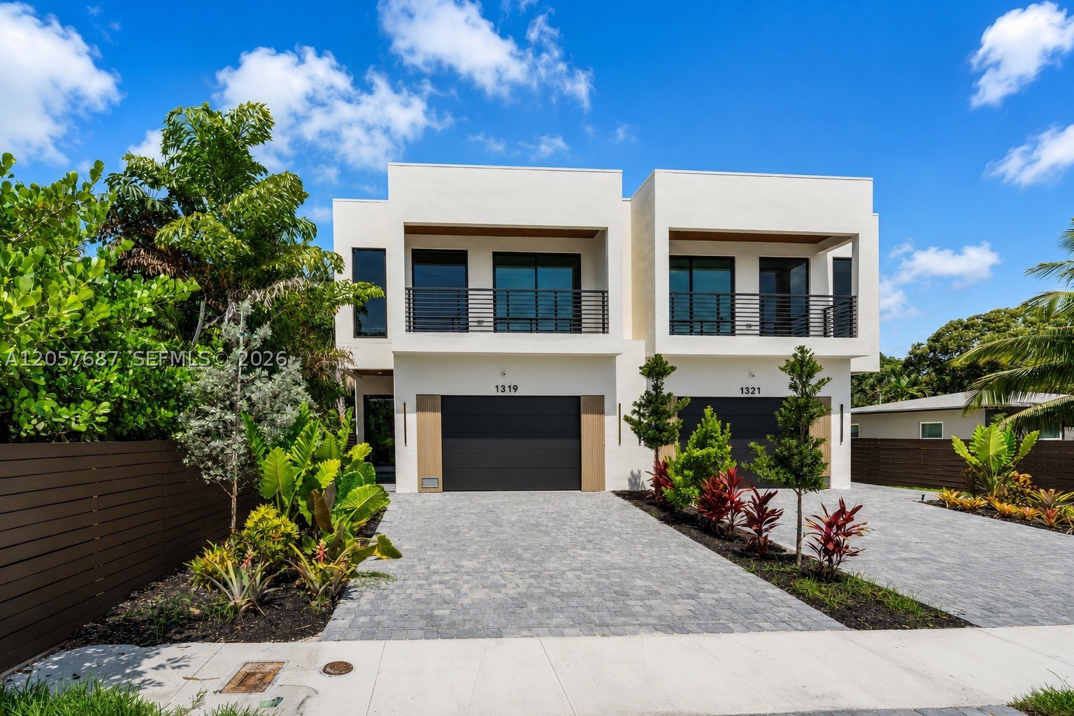 New construction luxury residence in one of Fort Lauderdale's most desirable neighborhoods. Designed with clean contemporary architecture and exceptional attention to detail, this 3BR+loft, 3.5BA home offers an open-concept floor plan, soaring ceilings, impact glass, and seamless indoor-outdoor living. The designer kitchen is the centerpiece of the home, featuring a waterfall quartz island, custom cabinetry, premium appliances, double wall ovens, and an oversized walk-in pantry. Walls of glass flood the living spaces with natural light and open to a private backyard oasis complete with a heated pool, summer kitchen, covered patio, and lush tropical landscaping. Upstairs, the spacious primary suite offers a private covered terrace, oversized custom walk-in closet, and spa-inspired bath with dual vanities, freestanding soaking tub, and oversized glass shower. Two additional en-suite bedrooms, a versatile loft ideal for an office or media room, full laundry room, and 2-car garage complete the home. Additional features include EV charger readiness, security cameras, designer lighting, premium finishes, and abundant storage throughout. Ideally located minutes from Las Olas Boulevard, Flagler Village, Downtown Fort Lauderdale, Holiday Park, world-class beaches, shopping, dining, and entertainment. A rare opportunity to own a turnkey luxury home in the heart of Fort Lauderdale.