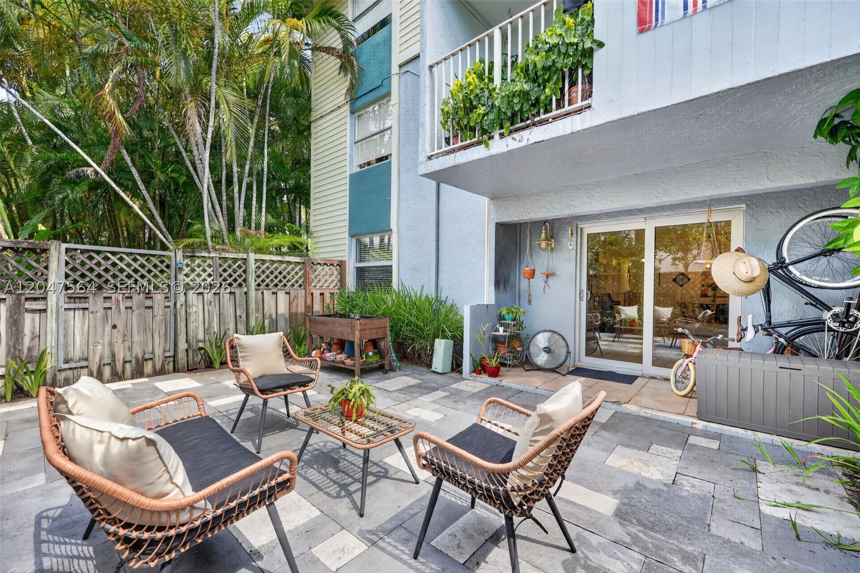 Welcome to your own tropical retreat in the highly desirable, gated Sunwood community. This beautifully updated first-floor corner unit offers exceptional privacy, abundant natural light, and a spacious 14.5’ x 20.5’ patio that opens to lush green space—perfect for relaxing or entertaining.

Inside, the home features impact windows and doors, renovated bathrooms and flooring (2019), and a rare layout with 2 full bathrooms—unlike most units in the community. Additional upgrades include a new tankless water heater (2025), new in-unit washer and dryer, and a thoughtfully designed living space that is truly move-in ready.

Residents benefit from a new community roof, recent termite fumigation, and the convenience of one assigned parking space. Ideally located in the heart of it all, you’re just minutes from top employers, shopping, dining, parks, and major highways, with many everyday conveniences within a mile.

A perfect combination of location, upgrades, and lifestyle—this is a standout opportunity in Sunwood.