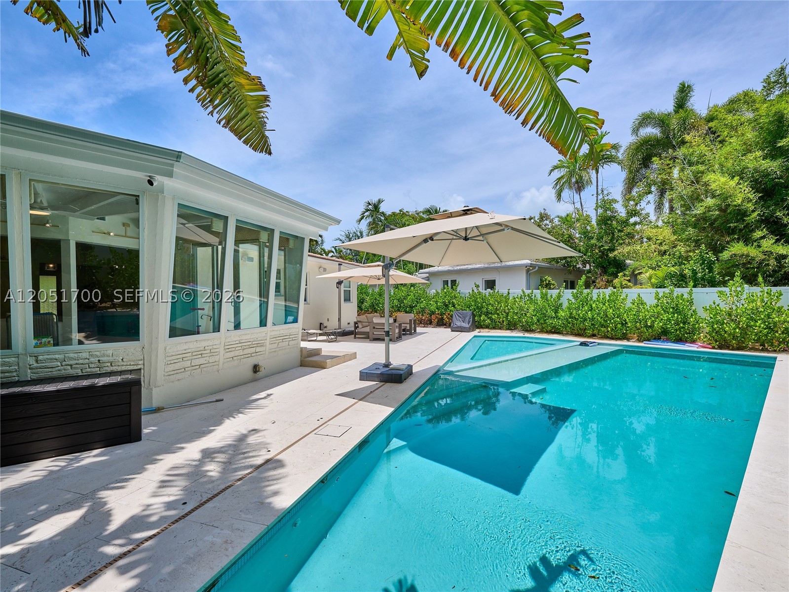 Chic Mid-Century Modern pool home on an oversized 9,350 SF lot in the gated Morningside neighborhood. This move-in-ready furnished residence offers 3 bedrooms, 3 bathrooms, and an open, light-filled floor plan designed for effortless indoor-outdoor living.

The private, fully fenced backyard is a true retreat, featuring lush tropical landscaping, a new 40-foot saltwater pool, a 20-person jacuzzi, and a one-car garage. Every detail has been thoughtfully updated, from the custom kitchen with Taj Mahal quartzite countertops and new appliances to the expansive great room, impact windows and doors, and elegant limestone flooring throughout.

Just moments from Morningside Park, one of Miami's premier bayfront parks, you'll enjoy access to eight lighted tennis courts, basketball courts, a new playground, a boat ramp, and beautiful waterfront green space. Mins to Cushman school, Miami Country Day, Wynwood, Design District, Miami Beach, airport, medical centers, & chic dining on the Upper East Side!