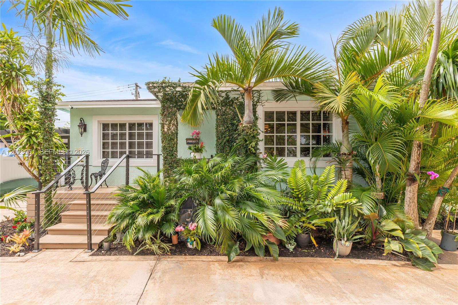 Beautifully maintained home with curb appeal in the heart of West Miami. This tropical oasis features rich oak hardwood floors, updated kitchen appliances, impact doors and windows, privacy fence, remodeled bathrooms and two new Rheem HVAC units for year-round comfort and efficiency. Enjoy generous storage space, lush landscaping, and an active, family-friendly neighborhood that appeals to all ages.