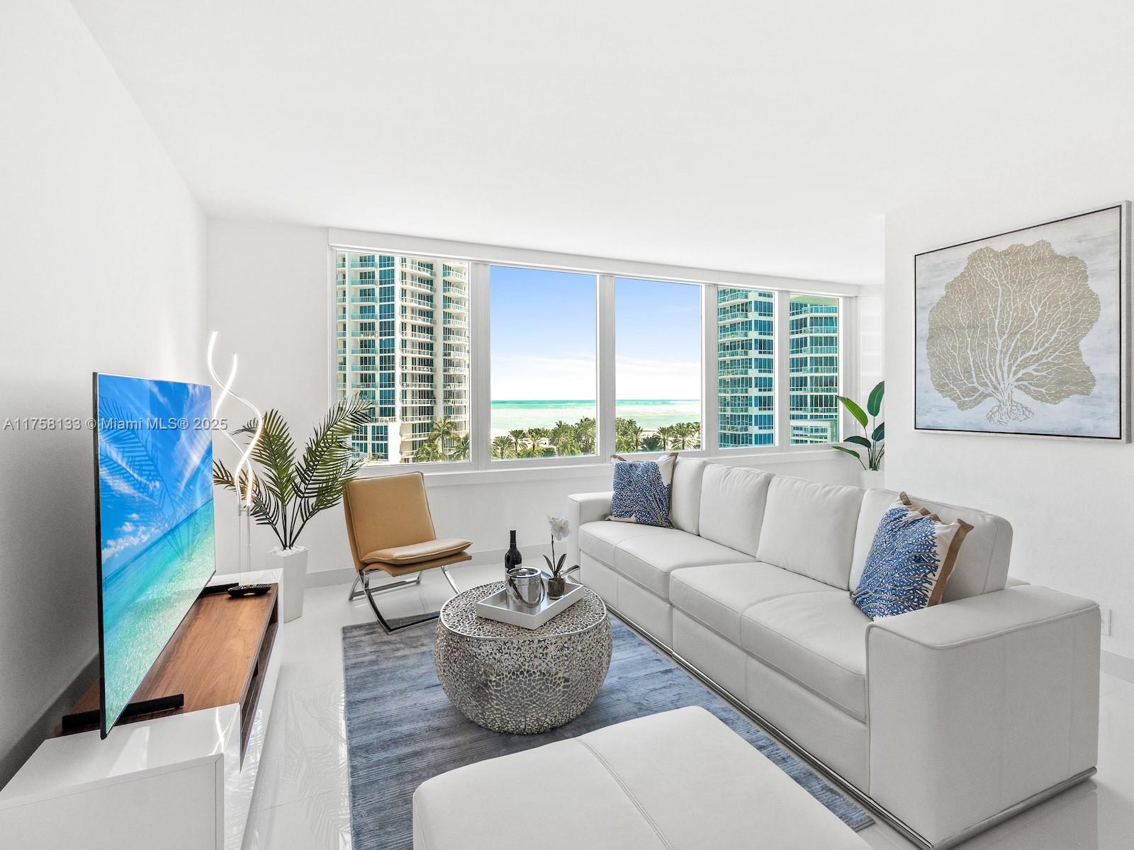 Completely remodeled 1 Bedroom+Den 2 Baths residence with sweeping ocean vistas in the renowned South of Fifth neighborhood. This stunning beach home features an elegant design & open floor plan flooding the residence with natural light & beautiful ocean views from every angle throughout. The oceanfront residence offers a sleek open kitchen with a huge countertop and stainless steel appliances, & perfectly outfitted with wood & glass cabinetry. Wake up to the ocean in the well-appointed master bedroom suite, with a modern ensuite bathroom with a walk-in shower and a large walk-in closet. The Den is equipped with a murphy bed with custom wall panels, lots of cabinets, and storage. A world-class 5-Star resort with pool, fitness center, tennis, security, valet, concierge, parks & restaurants.