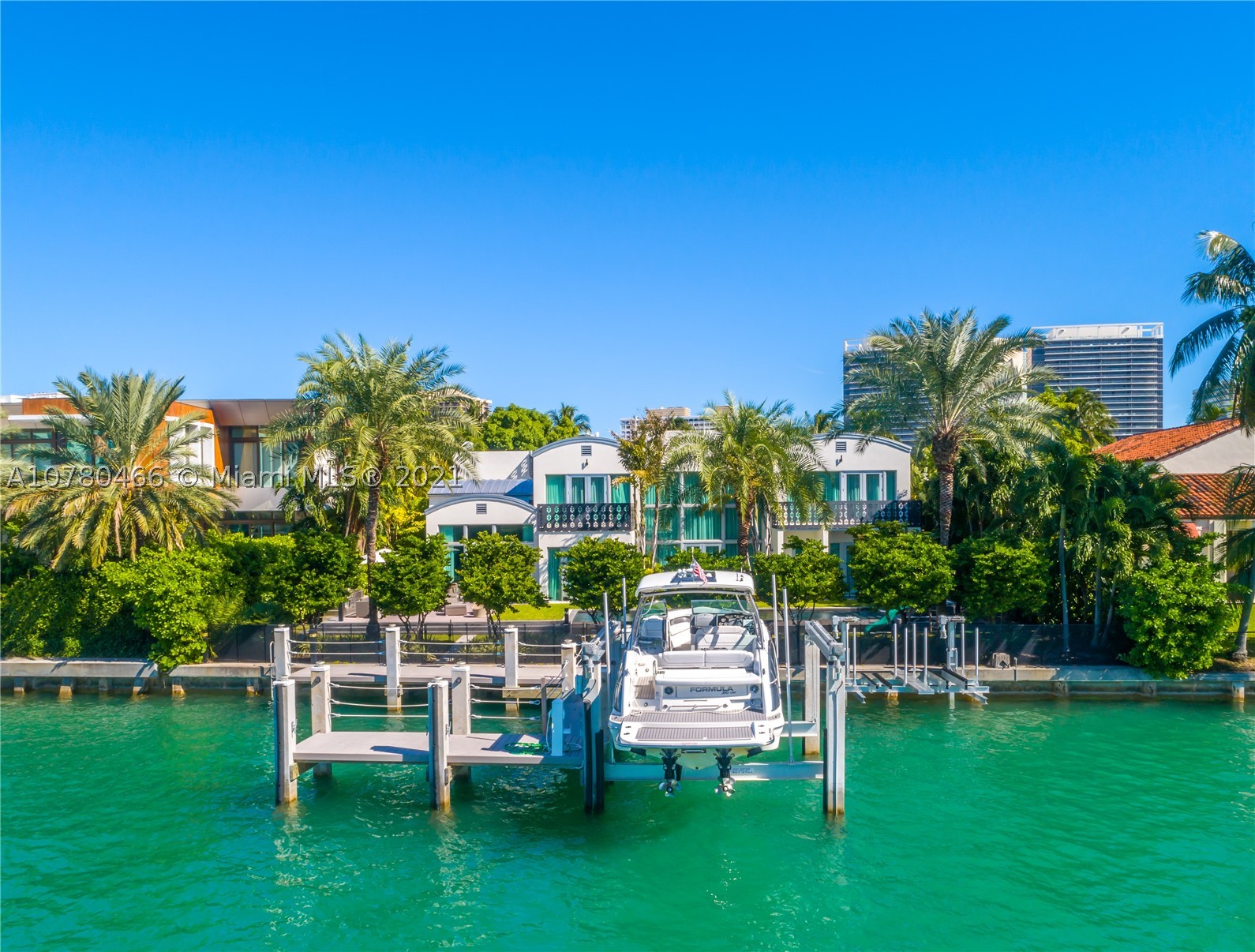 Unique contemporary waterfront home located in at the prestigious Bal Harbour Village with only 31 Homes.The nine-bedroom, 10.5-bathroom mansion inside the  upscale gated community.Situated on 21,225 square feet, the home boasts 100 feet of water frontage w/boat lift & dock.
This stunning home is furnished & appointed w/the finest amenities. Built w/solid concrete & impact glass thru-out. Also features a "Smart system," 3 car garage, rooftop observation deck, infinity pool, triple staircases, high ceilings, gourmet kitchen w/double appliances,outdoor terraces off every room w/sweeping water views. 
Architecturally distinctive on exclusive 24 hrs PRIVATE gated community. Easy Ocean access with no fixed bridges. Real Sellers.