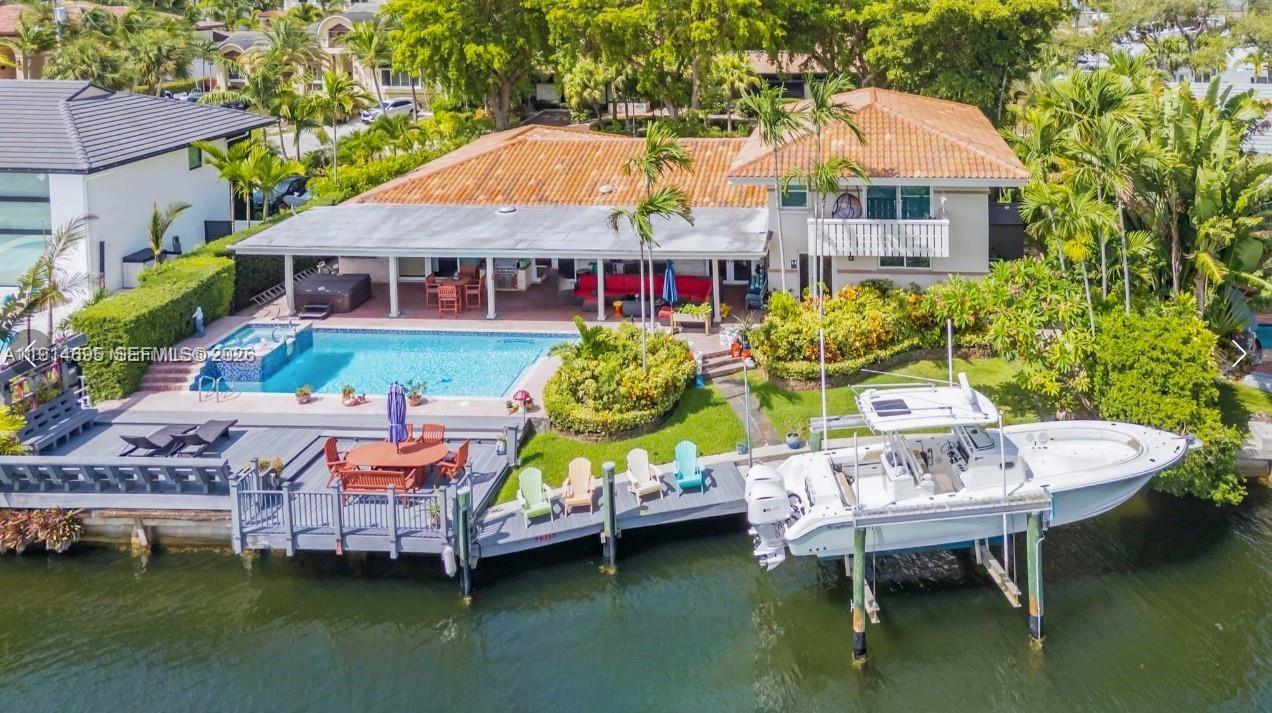 SANS SOUCI ESTATES 105' OF WATERFRONT oversized lot for a LARGE YACHT ! PLUS SEVERAL OTHER WATER TOYS, LOWEST PRICED 6 bedroom 4 1/2 bath 4500 ft.² IN SUBDIVISION !  Jacuzzi waterfall Pool plus second covered Jacuzzi, 1 CAR GARAGE , 3 Car Carport ! 2026 BRAND NEW CENTER ISLAND ITALIAN DESIGNER KITCHEN WITH "SUBZERO WOLF NATURAL GAS APPLIANCES, NEWER BATHS, Gorgeous modern design interior spread out to entertain HUGE MAIN SUITE WITH DEEP HIS AND HERS FULLY BUILT OUT WALK IN CLOSETS !!! 16,000 pound Boatlift. "Owner Will Finance W/40% Down" Great price for an oversize lot with a two-story modern house only 4.2 mil
owner relocated easy to see agent is 5 mins away...