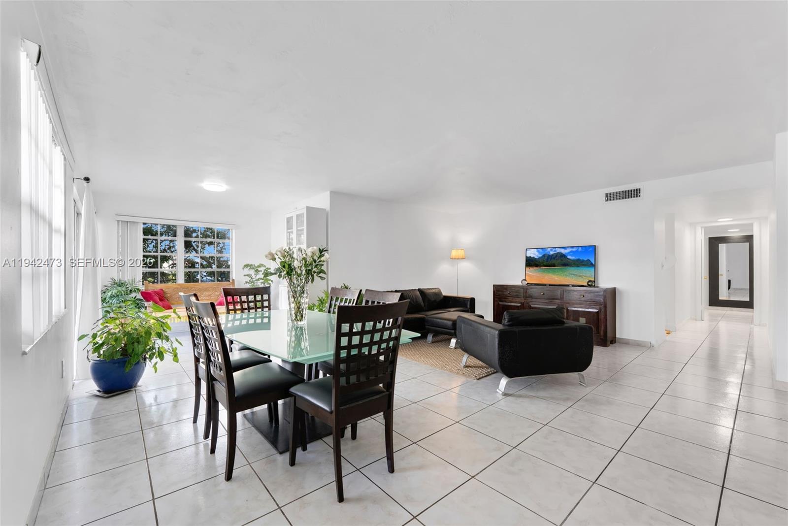 Your opportunity to live in The largest 2 Bedroom 2 Bath Garden Corner Unit in the Building!Spacious and well-laid-out corner residence offering tranquil garden views and private entrance.This is the biggest 2/2 model in the community, featuring ceramic/tile flooring throughout, generously sized  split floor plan bedrooms, and ample closet space with 3 walk in closets & more. The unit is located in a well-maintained building with relaxing pool. Park your car right outside your door (assigned parking) with guest parking available.New roof, freshly painted outside, updated pool. 

Centrally located near Biscayne Blvd, US-1, Aventura Mall, Bal Harbour, beaches, parks, shopping, dining, and major highways. Easy access to FIU, Barry University,Johnson &Wales University and public transportation.
Ideal for a primary residence or investment property as area is developing fast!Shopping plaza with Whole Foods, TJ Maxx, Starbucks, 24 hour Wallgreens at walking distance.

Pet-friendly community with low maintenance. Great value for size, location, and layout. Easy to show.