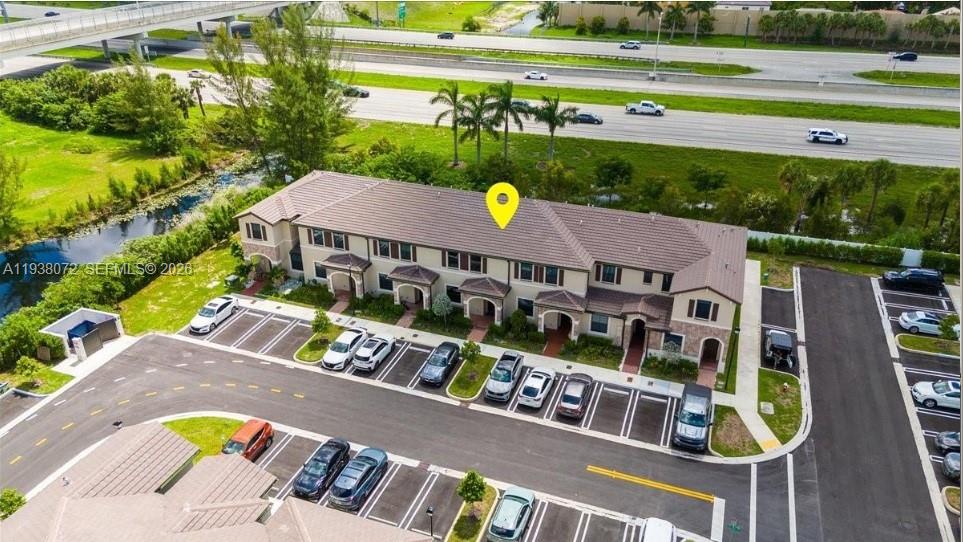 ***6% SELLER'S CONTRIBUTION TOWARDS CLOSING COST AT FULL PRICE OFFER ONLY***

Welcome to this spacious 3-bedroom, 2.5-bath townhome located in the highly desirable Aquabella North community. This well-designed home offers comfortable living with an open layout, ideal for both everyday living and entertaining.

Situated in a gated community, residents enjoy resort-style amenities including a modern clubhouse, fully equipped fitness center, sparkling community pool, and a children’s playroom, creating the perfect environment for families of all ages.

Aquabella North is known for its beautifully maintained grounds, family-friendly atmosphere, and convenient access to major highways, shopping, dining, and schools. This townhome is an excellent opportunity to enjoy a low-maintenance lifestyle in a vibrant, amenity-rich community.

A must-see home offering comfort, security, and lifestyle all in one.