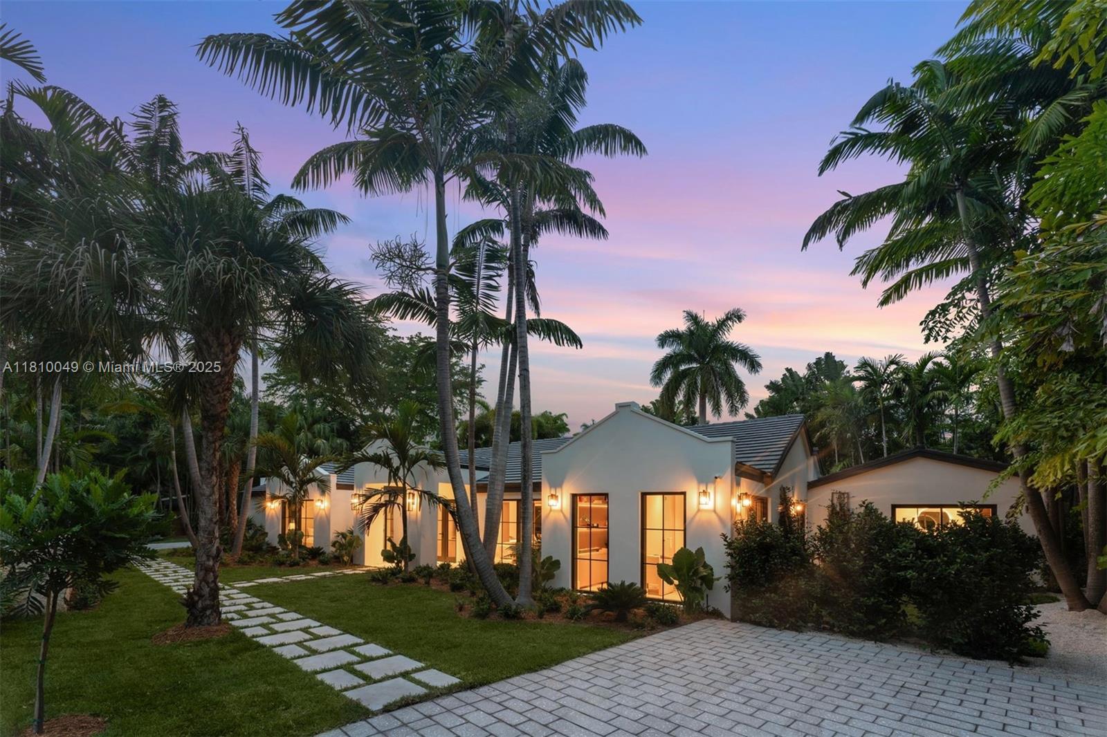 Located in the private and exclusive gated neighborhood of Ye Little Woods in Coconut Grove, this new luxury residence by CASA Development, designed by Farache Bromberg Design Studio, offers 5,077 SF of living space on a spacious 16,530 SF lot. It features 6 BD + flex room, 7.5 BA, bronze windows by Linea Rossa, hardwood floors, and a custom made kitchen with Miele appliances and Dekton countertops. Outdoors, enjoy a large pool, built-in BBQ under a pergola, shell-stone deck, a guest house with a kitchenette, and an attached garage. Modern comforts include frameless glass shower doors, infinity drains, La Cava fixtures, custom millwork, Cat6 wiring, Control 4 home system, alarm, security cameras, and built-in speakers. A perfect blend of sophistication and comfort.