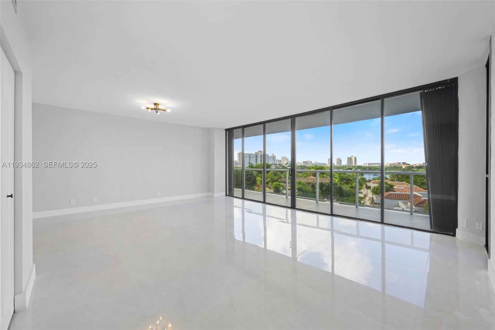PRICE TO SELL !! Fabulous & stunning newly renovated 3 Bedrooms / 2 Bathrooms modern residence in Hamptons West. Enter this corner residence through double doors into a spacious 1,800 sqft interior space with 2 large newly renovated glass terraces and amazing unobstructed golf views. The unit features a contemporary kitchen with stainless steel appliances and quartz countertops, modern marble bathrooms, a split floor plan for complete privacy, and ample closet space. The Hamptons community offers a Private Clubhouse w/5 Star amenities including 2 pools, private restaurant, movie theatre, fitness center & spa, tennis, coffee shop and more... All assessments have been paid by the Seller.