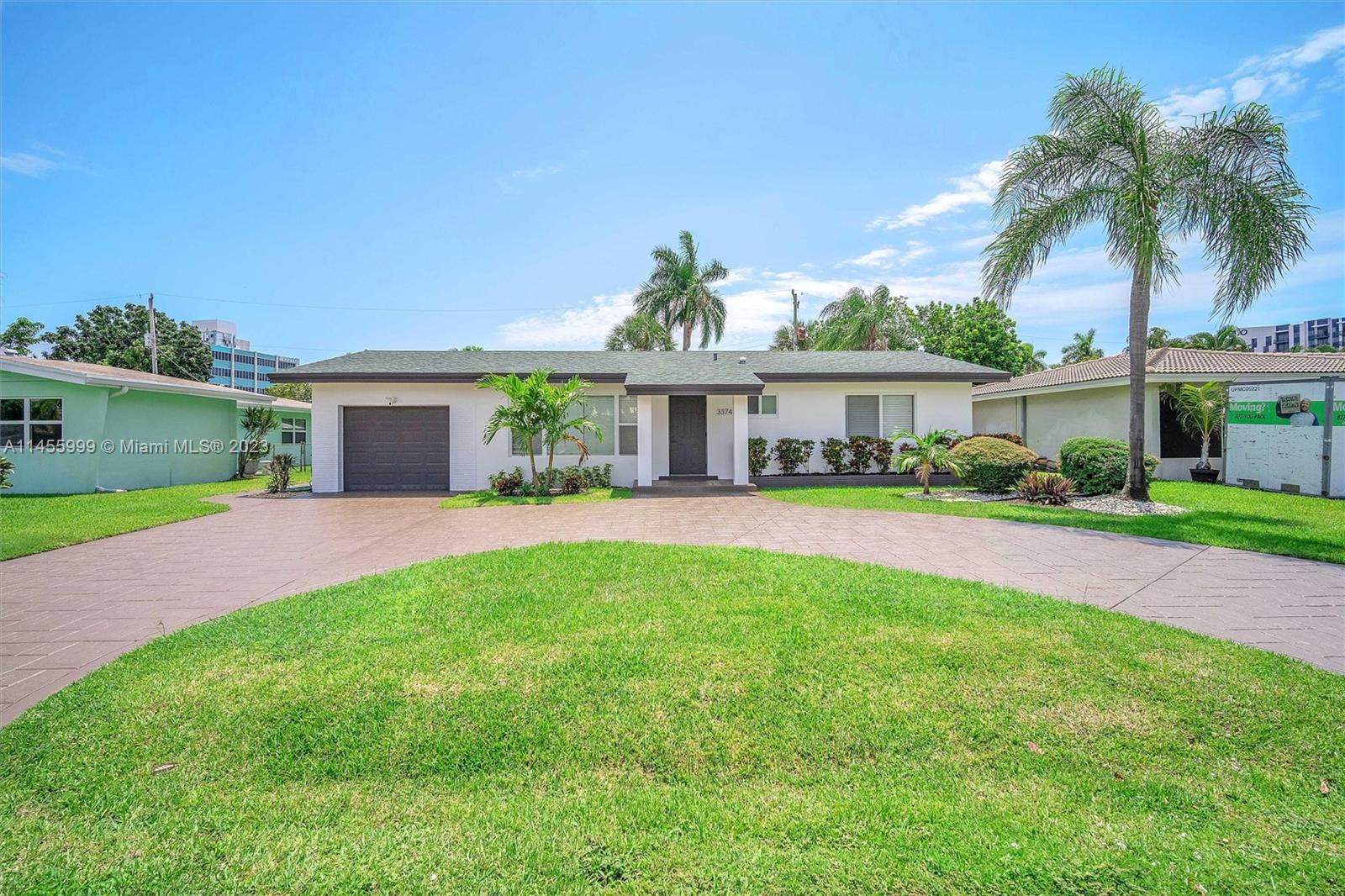 FULLY REMODELED WITH PERMITS 2023!!. Here is your dream, beautifully appointed home in a prime, central location. Manicured landscape, 2 master beds with 2 full baths plus 1 guest bed and 1 full guest bath, brand new big format porcelain tile and 100% waterproof high quality vinyl floors, new LED lighting and modern fans, new solid wood shaker, soft closing kitchen cabinets, luxurious quartz countertops, new samsung black stainless steel appliances, new high impact windows and doors, new electrical wiring all over, no cast iron underground pipes, all PVC for peace of mind, brand new 2023 A/C, new 2023 roof, new 2023 tankless water heater. Come outside to your own private oasis with a brand new travertine deck and a heated pool with 2023 diamond brite. Don't miss this opportunity!!!
