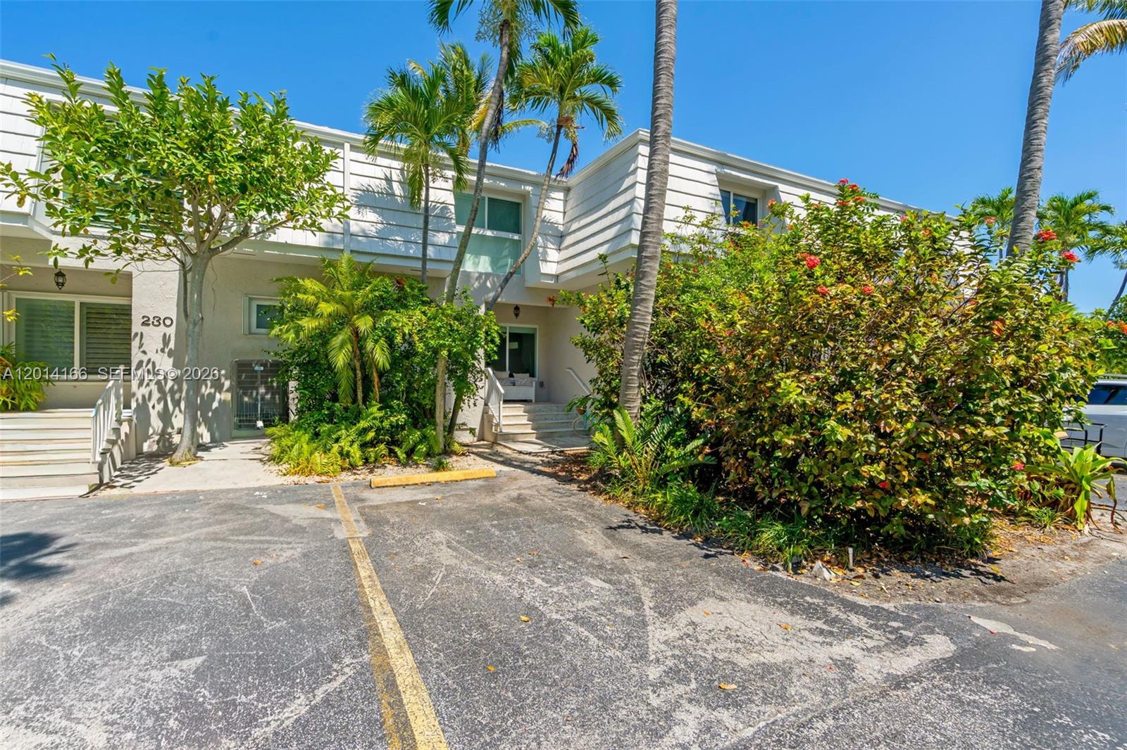 Beautifully remodeled 2 BR / 2.5 BA townhouse in the heart of Key Biscayne, a rare opportunity as townhomes like this seldom come to the market. Enjoy the privacy and convenience of townhouse living with no elevators or high-rise lifestyle. Features modern appliances, wood floors, and a spacious private patio overlooking the pool with lush tropical landscaping and space for a BBQ. Includes private beach access and is walking distance to restaurants, supermarket, schools, beach and the Ritz-Carlton. Community improvements underway include clubhouse, pool, tennis, and pickleball court renovations. New roof and updated electrical panel. Low HOA. Great potential for investors due to strong rental demand. Furniture negotiable.