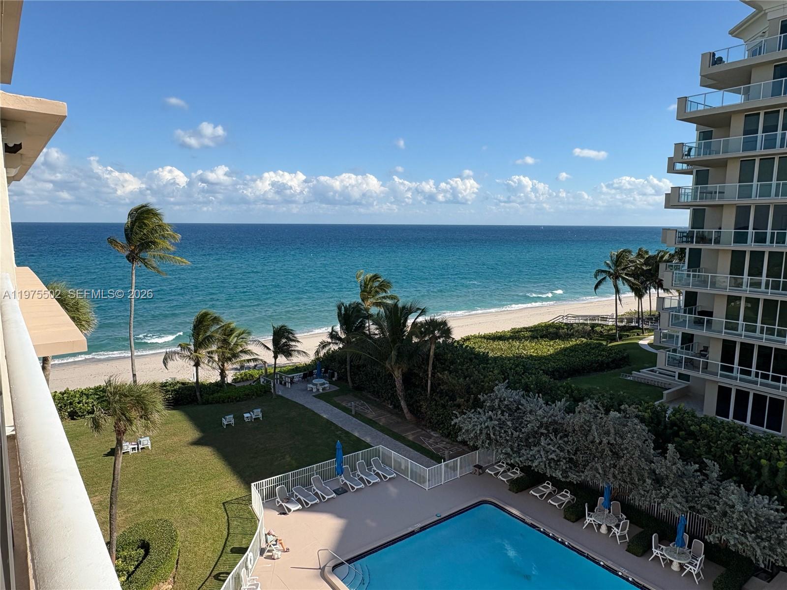 Experience coastal living in one of the most desirable stacks in the building. This spacious 6th-floor residence, the largest floor plan in the building, offers beautiful views of the ocean, canal, and pool. The south-facing terrace enjoys sunlight throughout the day while being naturally protected from strong winds by the building’s design. Hurricane-impact windows provide peace of mind. Recent updates include a new A/C unit installed in July 2025 and a hot water heater replaced approximately one year ago. The unit is offered furnished for convenience. A wonderful opportunity to enjoy the best of Hillsboro Beach living.