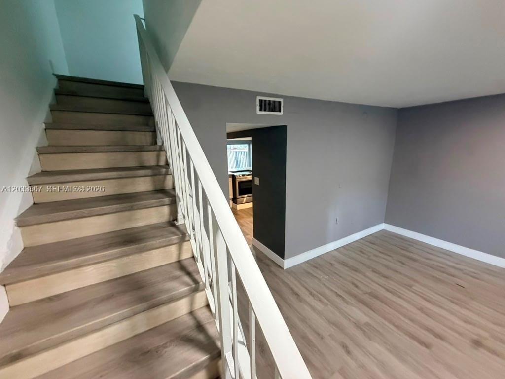Town house 2 bedrooms 2 full bathrooms, big living room, kitchen, laundry + back fenced patio Vacant unit for sell