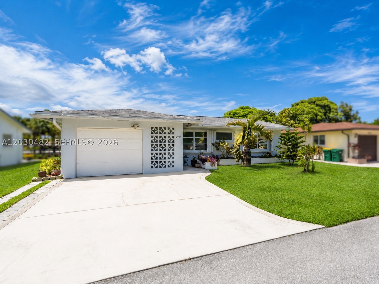 Spacious canal-front opportunity in a 55+ Tamarac community, designed for buyers who want comfort, flexibility, and a peaceful South Florida lifestyle. This 2-bedroom, 2-bath home offers almost 1,200 sq ft, with a sunroom and a large den, giving it more usable space than the bedroom count suggests. Whether you need a hobby room, reading lounge, office, guest space, or casual entertainment area, the layout provides room to live the way you want. The living room, dining room, kitchen, and bathrooms feature tile flooring, while both bedrooms offer laminate wood flooring. The kitchen includes newer dishwasher and microwave, and the primary bathroom was refreshed in 2025 with updated sink and wall tile. Step outside to enjoy canal-front scenery, local birdlife, and a backyard setting made for relaxing. A new paver patio and BBQ area were added in 2024, and the screened porch includes patio party lights for easy outdoor enjoyment. Accordion shutters on all windows add peace of mind, and the HOA maintains the sprinkler system. Mainlands of Tamarac Lakes offers a 55+ community setting with clubhouse, security, two community pools, and rentable party space, all close to everyday shopping, dining, parks, commuter routes, and beach access.