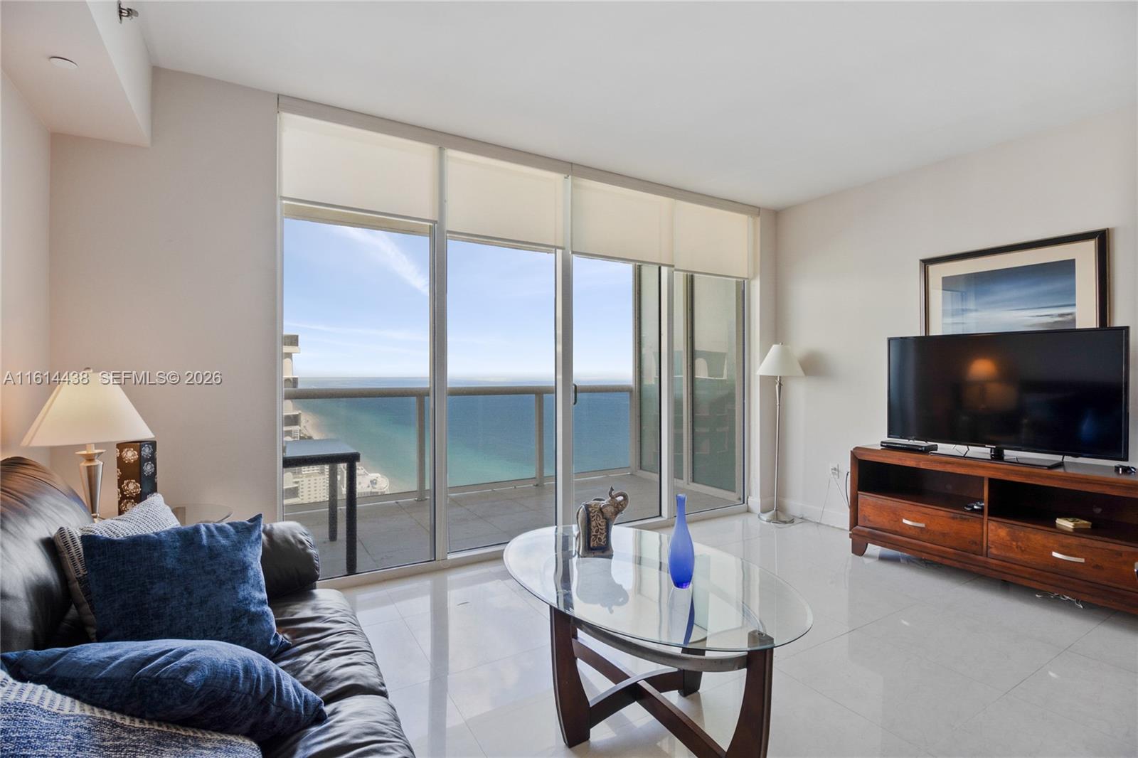 Experience luxury in this spectacular studio plus den, converted into a one-bedroom, model G with NE exposure. Enjoy breathtaking ocean and Intracoastal views. The European-style kitchen features kitchen-aid appliances. Amenities include a full-time concierge, 24-hour valet and security, three heated pools, a state-of-the-art fitness center, a 5,000 sq. ft. spa, and a poolside bar. Flexible rental policy allows 30-day rentals up to 12 times per year. This is coastal living at its finest. "Available now."