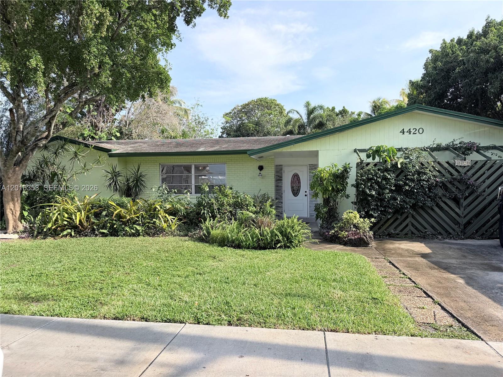 Welcome to a one of a kind tropical sanctuary in the heart of Lauderhill. Large well maintained home great for your growing family! Beautifully updated kitchen with granite countertops, stainless steel appliances, and white shaker cabinets. Split floor plan with large primary with ensuite bathroom and 3 generous size bedrooms. Newer HVAC, central air, tankless water heater and older roof but ZERO leak issues. Home is freshly painted and brand new insulation in the attic. Large entertainment room that can be converted back into a 2 car garage or utilized as 5th bedroom. Good size laundry room with ample storage. Close to shopping centers, restaurants and walking distance to elementary and middle school. Best of all, over 10,000 square feet lot with expansive, lush backyard. Large patio area for entertaining, orchid house and very mature fruit bearing trees - lychee, tamarind, carrie mango, star fruit, black sapote, sweetsop and Surinam cherry and papaya.

NO liens or violations. CLEAN TITLE! NO WHOLESALERS NO LOWBALL!!