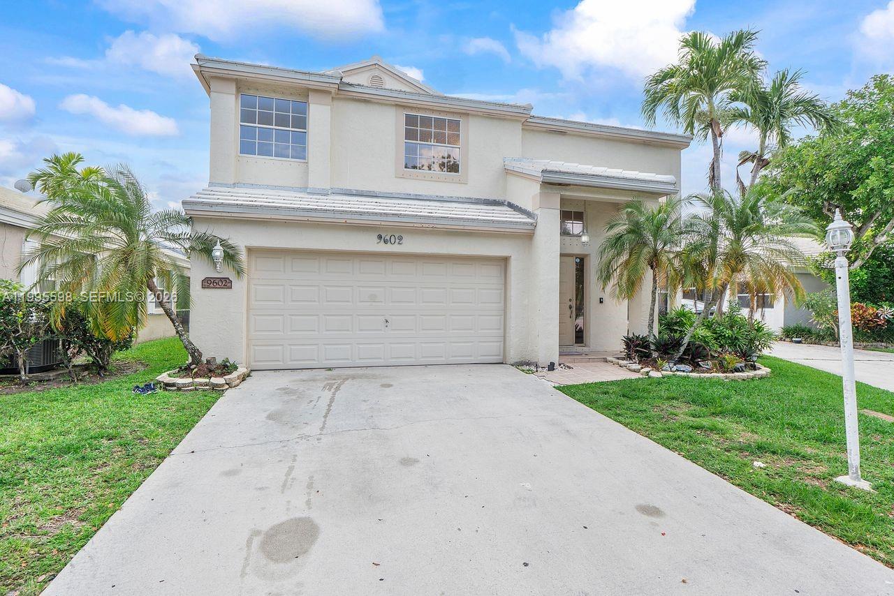 Welcome to this well-maintained 4-bedroom home in the gated community of Jacaranda Pointe in Plantation. Offering a spacious and comfortable layout, this residence is perfect for everyday living and entertaining. Enjoy peace of mind with a newer roof (2019) and a prime location close to shopping, dining, parks, and major commuter routes.