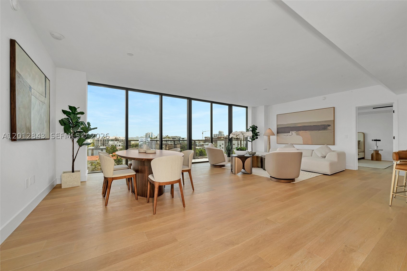 BE ONE OF THE FIRST to live in Bay Harbor Islands’ most anticipated wellness residences. Spectacular fully furnished top floor unit at THE WELL Bay Harbor. This spacious 2-bedroom, 2.5-bath split floor plan is one of the nicest residences in the building, featuring 1,700 sq ft of beautifully designed interiors, two private balconies, and stunning open views of the bay and Bay Harbor Islands. The monthly HOA fee includes membership to THE WELL Club onsite featuring a 13,000 sq ft wellness and fitness center with exceptional amenities and services, including expert practitioners, medical director, daily fitness classes, curated wellness programs, and access to a luxury private beach club in Bal Harbour. Residents also enjoy a fantastic rooftop pool deck with cabanas, a tea library, a second private gym designed by Perigon Fitness, a Zen garden, kayaks, paddle boards, 24-hour valet, front desk, wellness concierge, and exclusive house car service. Green-certified, boutique full-service building incorporating advanced wellness features throughout, including UV water filtration system, air purification, a Grohe kitchen faucet offering filtered sparkling and chilled water options, built-in red light therapy integrated into the primary bedroom closet, Affusion spa shower with lymphatic massage system, and an in-residence hydroponic herb garden device. Two assigned covered parking spaces and a private A/C storage unit are included. The wait is over — your health has a new address.