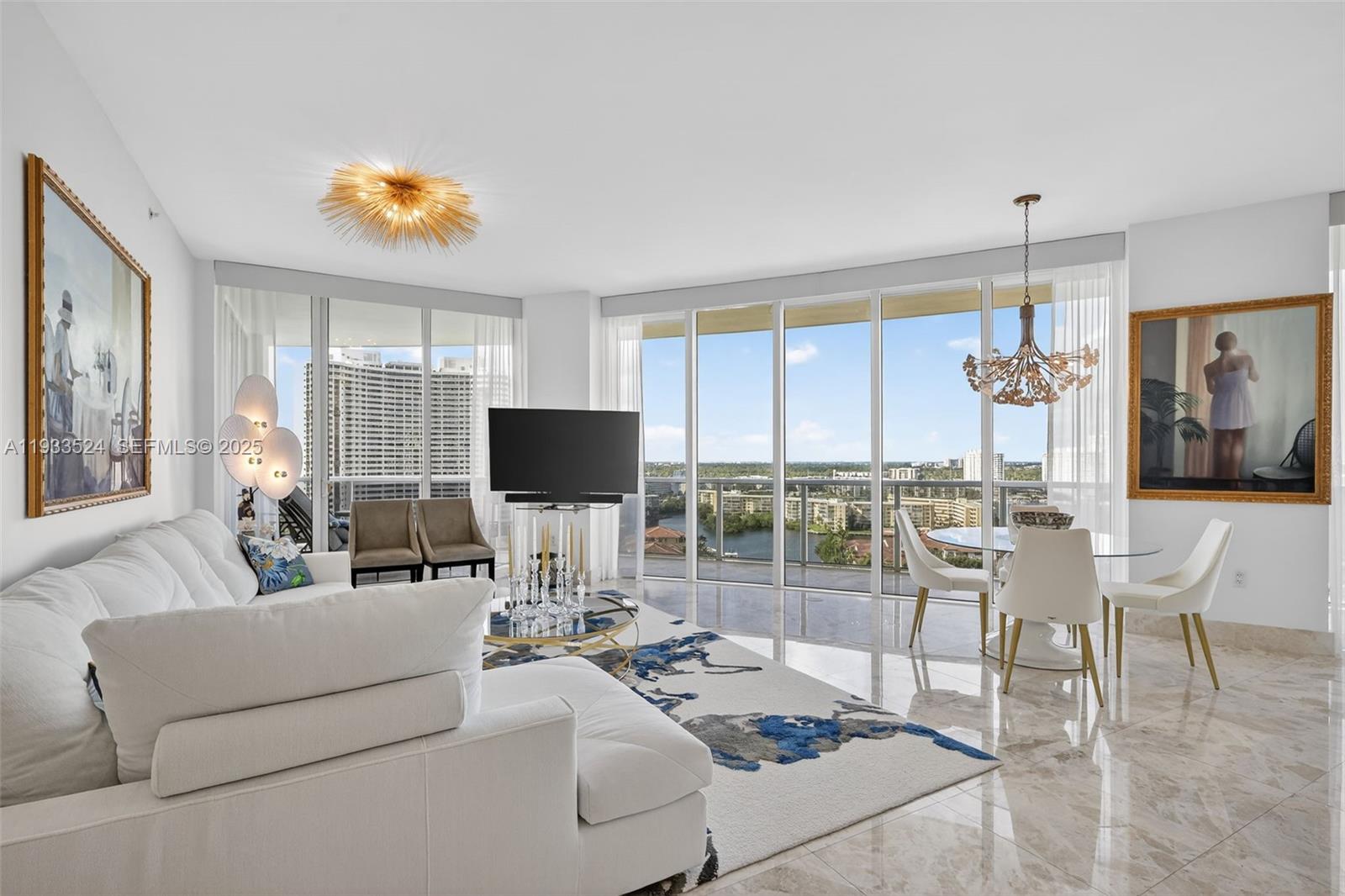 Luxury 3 bed/3 bath flow-through residence Bellini, Williams Island’s newest, exclusive tower. A private elevator opens to 2,235 sf of refined living with polished marble floors, and floor-to-ceiling windows with panoramic Intracoastal views. Each room opens to a wraparound balcony. The Split plan offers spacious suites. Lavish master suite with custom closets, master bath marble and gold fixtures, double vanities, glass shower, jacuzzi and private lavatory. The European style kitchen has Poggenpohl cabinetry, absolute black granite counters, Sub-Zero - Miele appliances, wine cooler. A boutique building, only 70 homes, offers personalized services: valet, fitness center, Pilates studio, pool, and full access to Williams Island’s 14 TENNIS COURTS, 4 PICKLE BALL COURTS, 2 PADEL COURTS, 3 RESTAURANTS, STATE OF THE ART SPA, MARINA, WALK/JOG PATH, KIDS PLAYGROUND, BASKETBALL COURT, SOCCER FIELD, PUTTING GREEN, COURTESY BUS, PLUS GOURMET SUNDRY COFFEE/GELATO SHOP, AND SO MUCH MORE....
