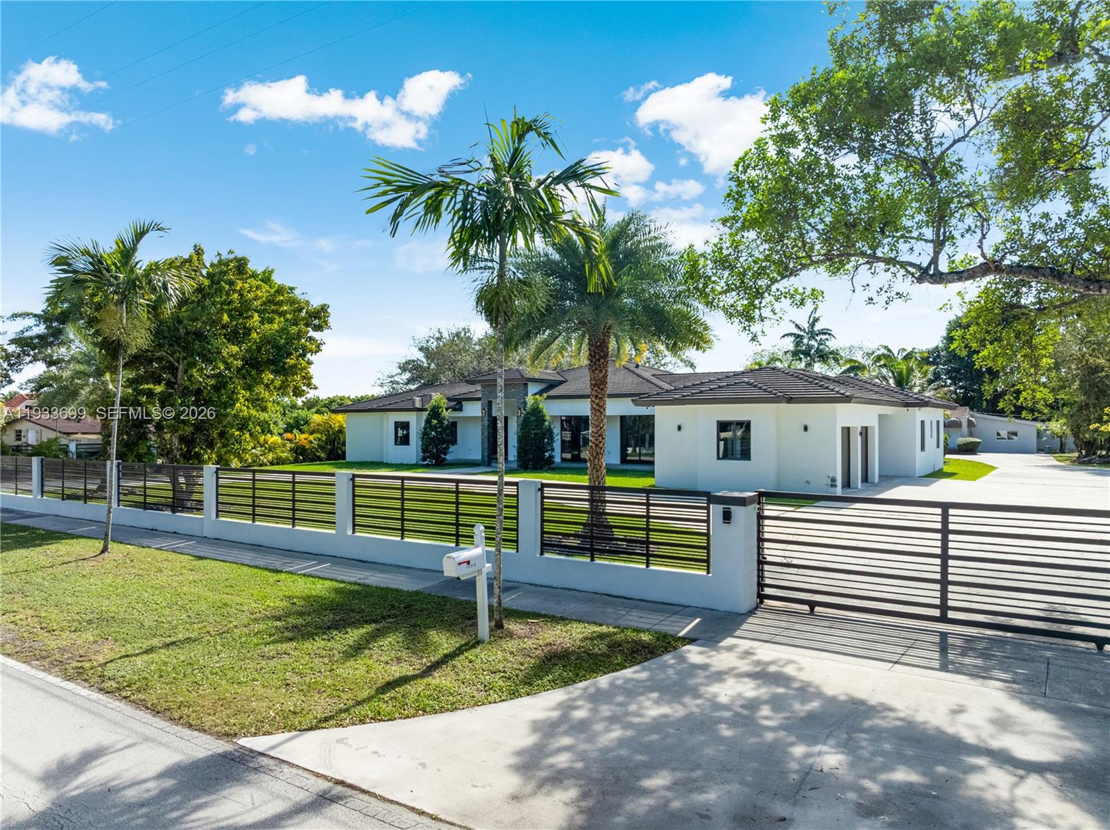 This extraordinary property offers a rare opportunity to enjoy both space and sophistication with two separate residences on one expansive 52,707 s/f lot. Thoughtfully designed for flexibility and privacy, the estate is perfectly suited for multigenerational households or anyone seeking additional living options without compromise. The primary home encompasses 5,764 total s/f featuring 5 bedrooms and 5 bathrooms. Designed with hosting and everyday comfort in mind, it includes a gourmet kitchen, spacious common areas ideal for gatherings, and a dedicated laundry room with separate washer and dryer. Complementing the main residence is a second home spanning 1,985 s/f offering 3 bedrooms and 2 full bathrooms. This home includes a complete kitchen, dining area, and a charming front porch creating an inviting space to relax and connect with family.
Located in the desirable Miller Estates, this property delivers more than just a place to live—it provides a lifestyle rooted in community, privacy, and exceptional versatility.