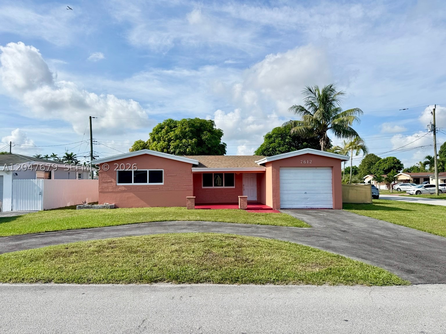 Fully Rehabbed and charming 3 Bedroom, 2 Bathroom single family home in Miramar Tropical Homes neighborhood.  Corner lot, circular drive way, impact doors and windows, new roof and updated throughout.  Fruit trees in back yard and lots of space for a pool.  1 car garage, washer/dryer.  Lots of daylight and friendly neighbors.  Priced to sell!