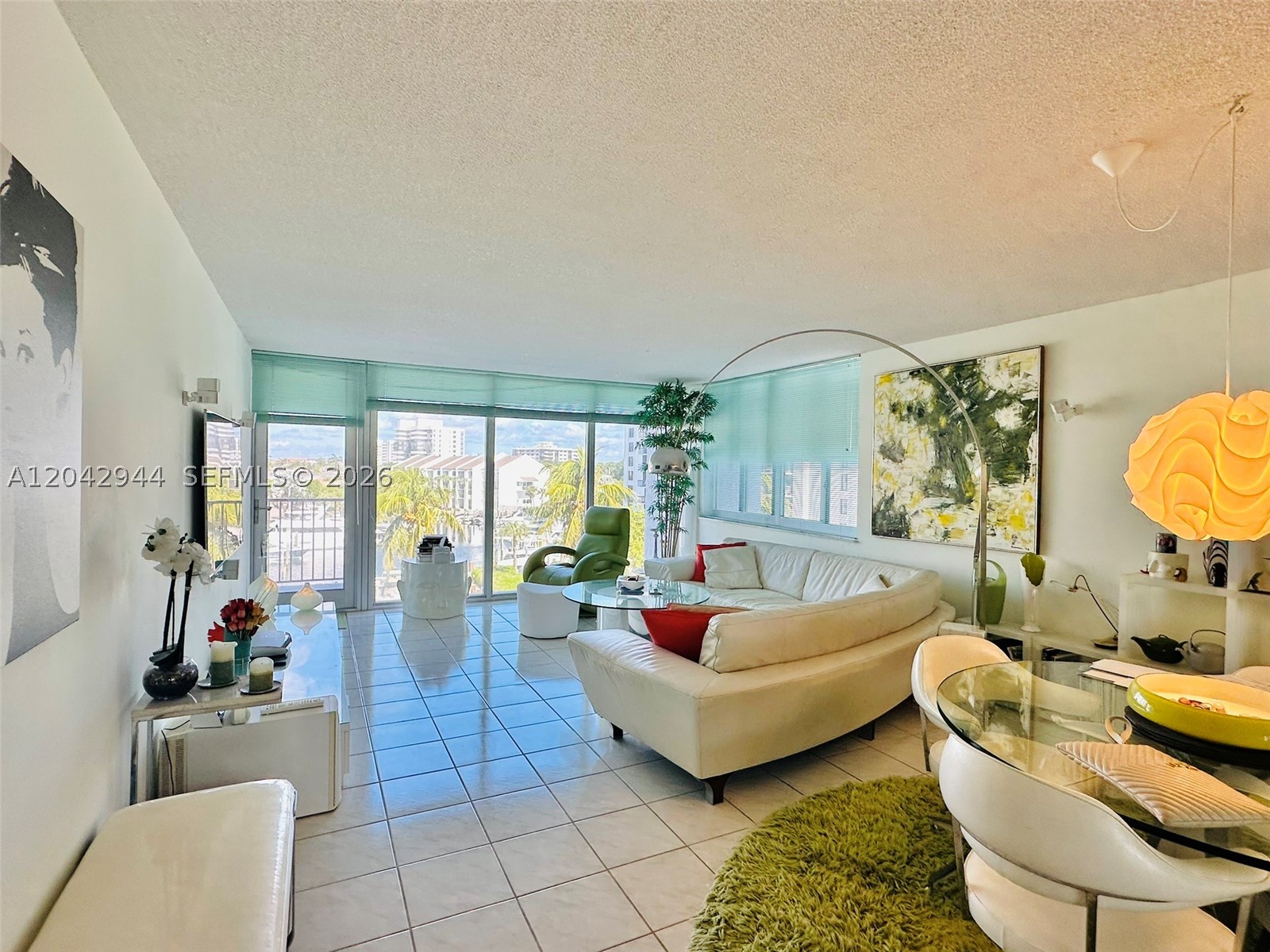 Experience Coastal Luxury Living Just Off A1A Wake up to breathtaking ocean and Intracoastal views in this stunning 2-bedroom, 2-bathroom residence featuring an oversized balcony with access from three separate rooms. Enjoy exclusive access to a private Oceanfront Beach Club and marina-side boat parking just steps from your door. This elegant home offers generous walk-in closets, a thoughtfully designed layout, and resort-style amenities including a fully equipped fitness center, stylish event space, and a pristine pool area. Ideally located near upscale shopping and fine dining, this property is perfect as a full-time residence or a high-yield investment opportunity. Assessments are fully paid. Easy to show—contact me today to schedule a private tour. Special Assessments paid in full by seller.Painting & Concrete reconstruction has been done and there are no upcoming assesments