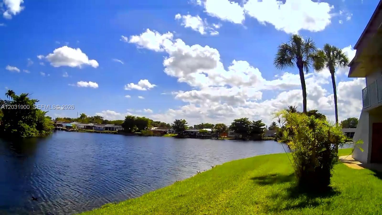 Beautiful first-floor corner unit with serene lake views in the desirable Royale Green Community. This well-maintained residence features updated kitchen cabinets and countertops, remodeled bathroom, tile flooring throughout, washer and dryer inside the unit, and plenty of guest parking available 24/7.
Per public records, the property is a 2 Bedroom / 1 Bathroom unit. As per owner the den has been converted into a third bedroom with its own closet and is currently being used as a 3-bedroom residence.