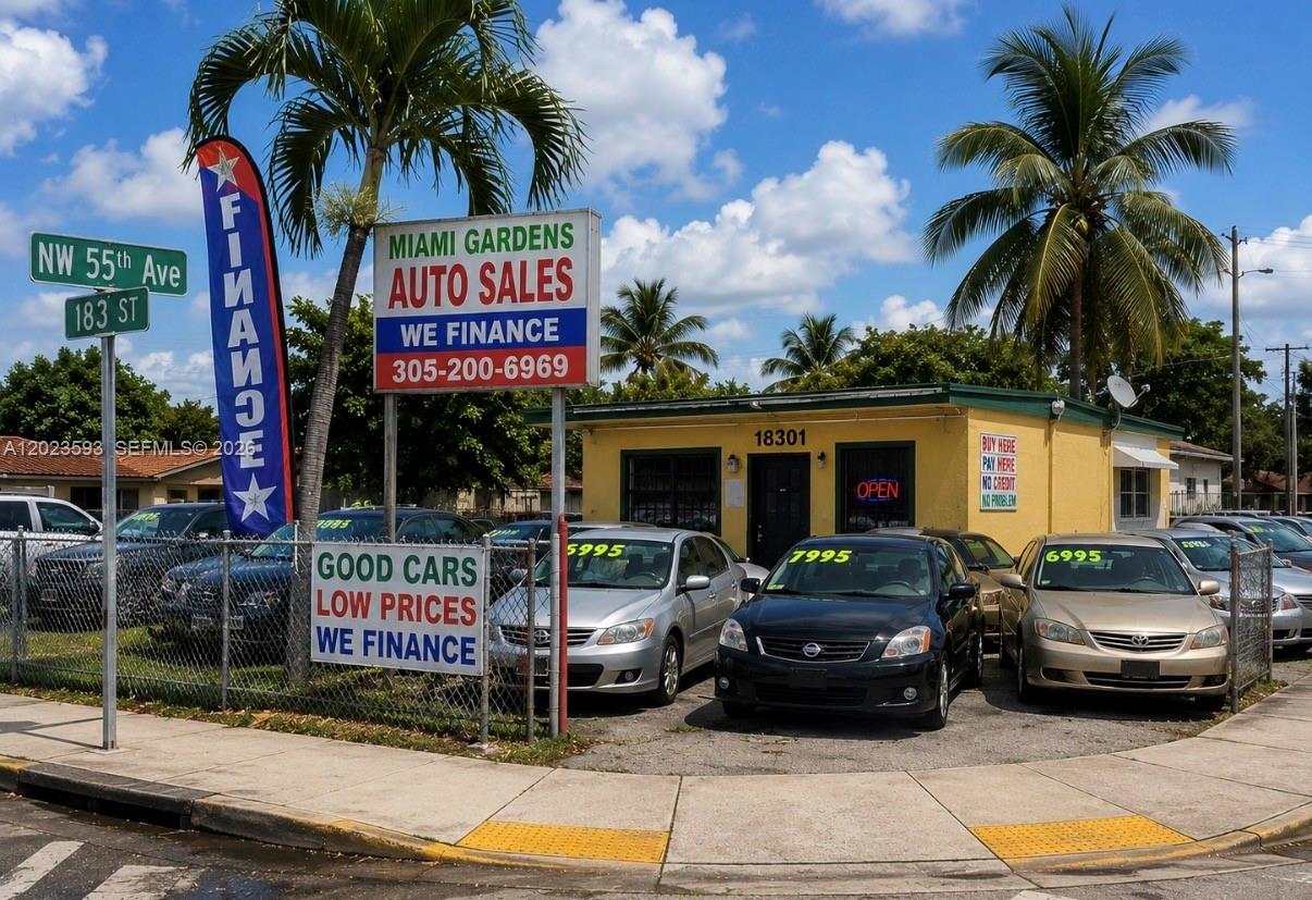 Location undisclosed, must sign NDA. Business + Real Estate included! Picture presented was generated with AI and is not the actual dealership. Established auto dealership operation in Miami-Dade County featuring prime hard corner location with dual folios totaling 13,000 sq ft. This turnkey opportunity includes all necessary licenses for retail and wholesale operations, providing maximum flexibility for growth. Operating since 2012, this dealership generates $2.4 million in annual revenue with consistent monthly sales volume of approximately $200,000. The operation maintains an inventory of 10 vehicles rotating and employs 4 staff members. Two separate folios included: 6,100 sq ft and 6,900 sq ft parcels with dedicated warehouse (768 sq ft) and office space (560 sq ft) on each lot. Real estate valued at $2 million. Prime hard corner positioning provides excellent visibility and traffic flow. Primary dealership operations generate substantial monthly sales volume. Additional income from tenant-operated dealership on second folio currently paying $5,000 monthly rent. Lease expires this year with potential increase to market rate of $8,500 monthly, representing significant upside opportunity. Licensing & Operations: Independent motor vehicle dealer license with wholesale capabilities included. All required permits and qualifications transfer with sale, ensuring seamless transition for new owner.