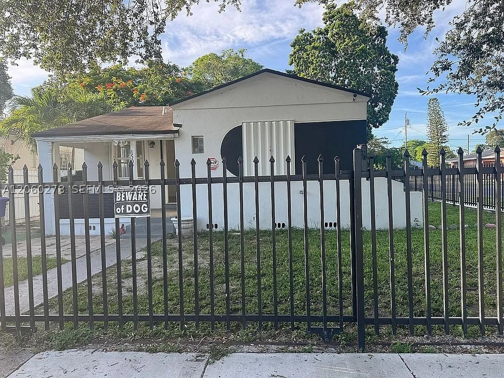 Exceptional corner-lot home in Miami’s NW area, just minutes from I-95, SR-112, and Miami International Airport. The property features 2 spacious bedrooms, 1 updated bathroom, a modern kitchen, and a generous backyard ideal for entertaining in the main home. 2 private studio units, each with a full bath, generate approximately $3,000/month in rental income. Ample parking, including space for an RV, adds outstanding value.