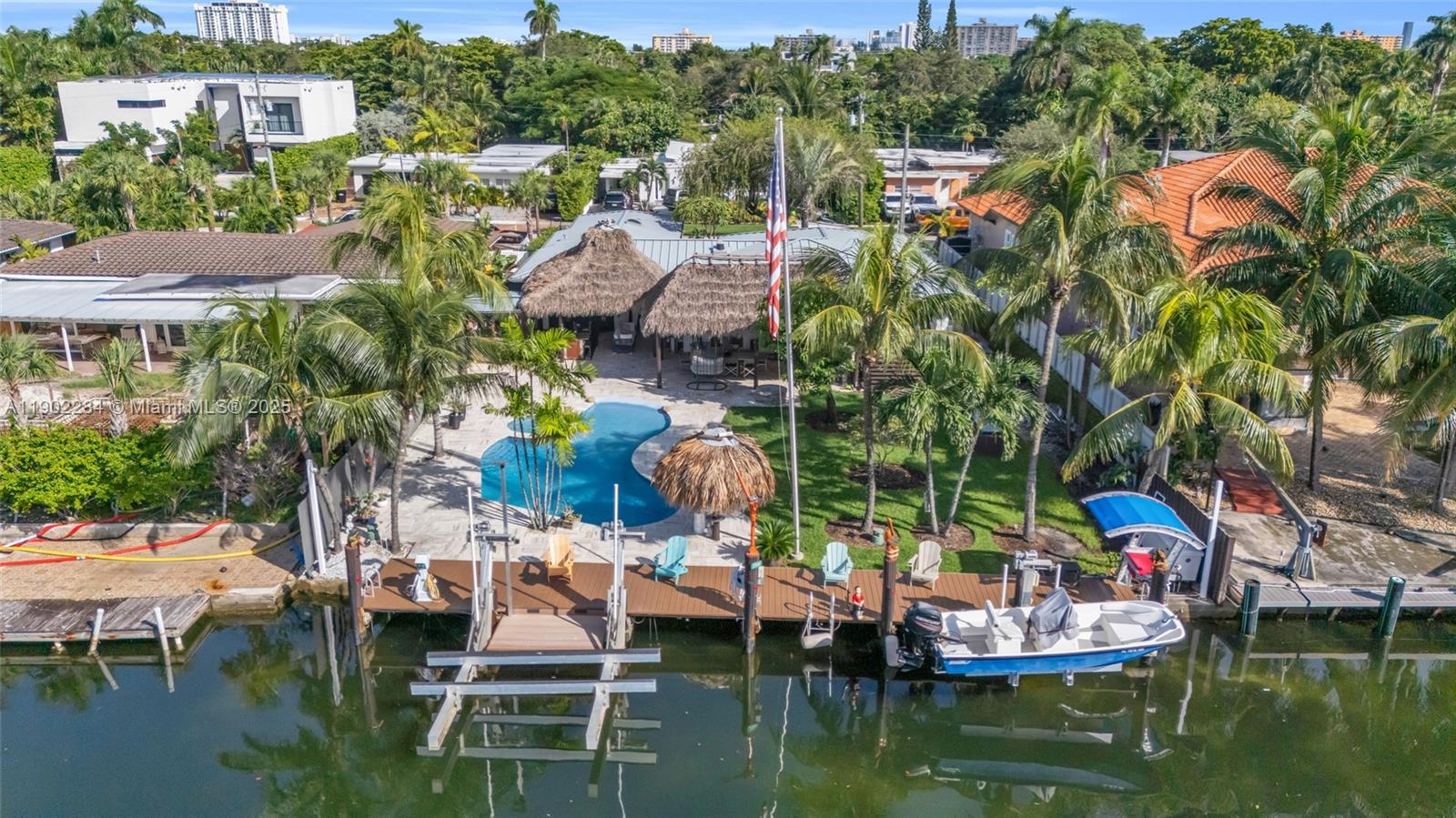 Waterfront Paradise in Keystone Point Experience true Florida living in this rare waterfront gem featuring 75 feet on the water and effortless indoor-outdoor elegance. Enjoy a custom beach-entry pool, waterfall jacuzzi, and two tiki huts with a full outdoor BBQ kitchen, perfect for entertaining. Inside, a chef’s kitchen with Wolf gas cooktop, Sub-Zero refrigerator, and the spa-inspired primary suite with walk-in closet create the ultimate retreat.
Boaters will love the 13-ft bridge clearance, 24,000-lb boat lift, and gas pool heater, ideal for year-round enjoyment. Keystone Point, North Miami, where luxury meets coastal lifestyle.