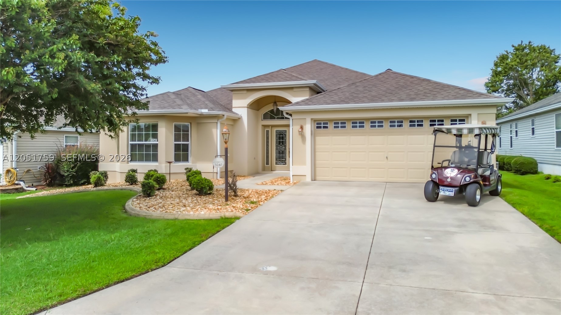 A Must See! This may be  The Villages' 'BEST-BUY' in 2026.  This 'Lily Model' is being sold Furnished, Turn-Key + Yamaha *Golf-Cart (see co-op doc.) with accepted contract within 30-days !   New Roof and HVAC just installed. 3-BR,  2-BA, Over 2,100/sf total Living space, double garage (+ free-golf-cart, Buyer incentive!).  Move right in & adjust the decor as you prefer.  This is an easy move and may give a buyer time to close on their residence back home!  Includes  ALL appliances, Light fixtures, furniture + Yamaha golf cart!  Vaulted/coffered/tray ceilings, make the home seem even more spacious.  Primary B.R. suite features big walk-in closet & a Roman shower.  Truly a ‘Great Buy'. Large B.R.'s and Baths and a full-length Lanai. Blinds & Shades included.  Epoxy Garage floor & extra built-in storage cabinets in garage.  The Lanai has retractable shade-screens.  Laundry room has a wash-basin and a small, personal office-space.  Dont delay.  Wont last long at this price. Call for private viewing & we'll submit your offer B4 others win out.