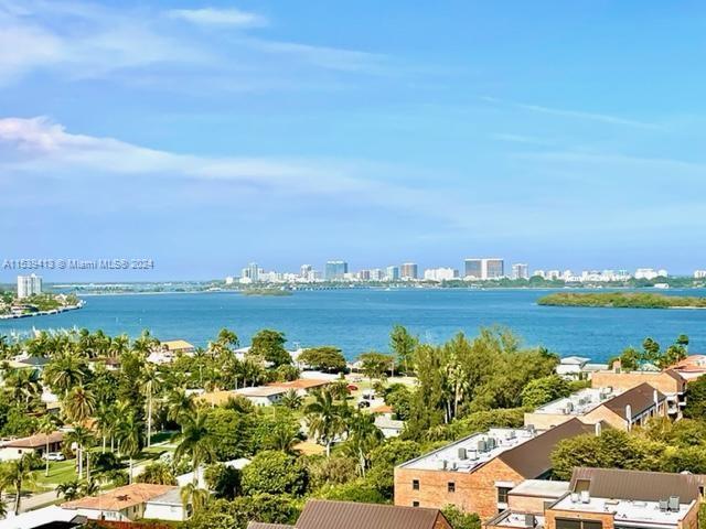 BACK ON THE MARKET!! PRISTINE & SPACIOUS 2 BEDROOM/2 BATHROOM, SPLIT FLOOR-PLAN WITH PANORAMIC BAY & OCEAN VIEWS. PORCELAIN TILE FLOORS, NEW APPLIANCES, NEW WASHER/DRYER, NEW CARPET IN BEDROOMS, COVERED PARKING AND EXTRA STORAGE! COMES WITH STORM SHUTTERS. LIVE IN A WORLD CLASS COMMUNITY AND ENJOY ITS MANY AMENITIES... SPA, TENNIS, GYM, SPORTS CLASSES, MARINA, POOLS AND RESTAURANTS. CABLE AND INTERNET ARE INCLUDED IN THE RENT. CENTRALLY LOCATED, CLOSE TO BOTH AIRPORTS, MALLS, SHOPS & MORE. EASY TO SHOW!
