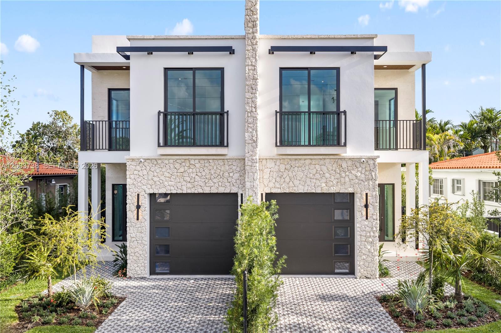 Modern luxury meets timeless Miami elegance in the heart of Silver Bluff. These brand-new 4-bedroom, 4-bathroom townhomes offer nearly 3,000 sq. ft. of thoughtfully designed living space just minutes from Coconut Grove, Coral Gables, and Brickell.

Natural stone accents flow from the striking exterior into the grand entrance, creating a warm and sophisticated first impression. Inside, each residence features impact glass windows and doors, designer lighting, imported finishes, and built-in ceiling speakers for seamless indoor and outdoor entertaining.

The chef’s kitchen is beautifully appointed with Italian cabinetry, quartz countertops, and premium stainless-steel appliances. Open-concept living spaces flow effortlessly to a private terrace and stunning coral accents —perfect for entertaining under the Miami sky.

Additional highlights include smart-home technology, dry bar on the second floor, a one-car garage and pool

Located within walking distance to Coral Way cafés, top-rated schools, and the vibrant lifestyle of Coconut Grove, this is a rare opportunity to own luxury new construction in one of Miami’s most desirable neighborhoods.
