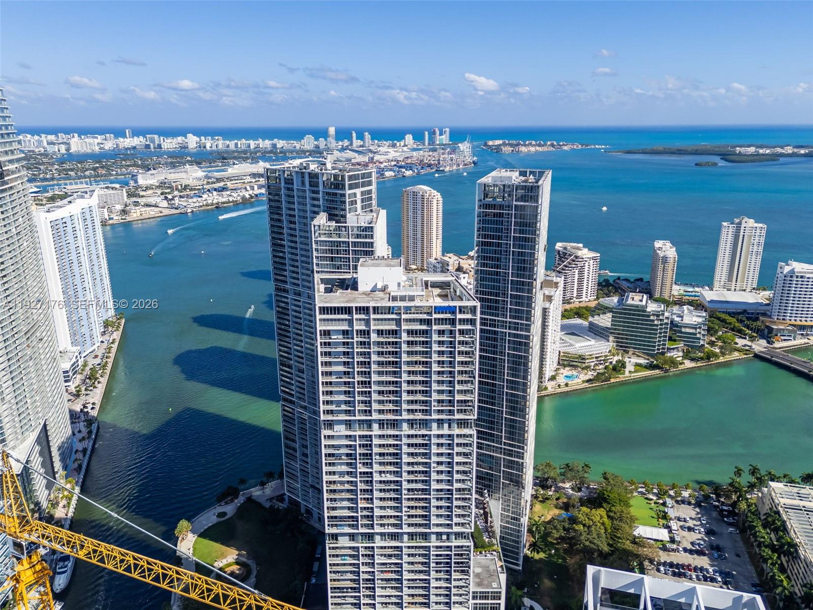 One of the most iconic buildings in South Florida designed by Arquitectónica with interiors by Philippe Stark . Best line in the building with spectacular views of Brickell Key, Biscayne bay and Skyline, from every room. Featuring a balcony ideal for entertaining. Split floor plan with 2 bedrooms, 2 bathrooms, plus a den.This den can be used as an additional bedroom or a TV room.
High-end Miele and Subzero kitchen appliances . Marble floors throughout. Custom-made walk-in closets and window treatments. The building offers state-of-the-art amenities: a 300-ft swimming pool, a 50-ft person hot tub, spa/fitness center, game room, poolside café, on site restaurants and 24-hour full-service concierge/valet parking. Steps from Brickell Key City Center, world class dining, shopping and entertainment. Cable and internet included. One assigned parking space. Sold unfurnished. Easy to show.