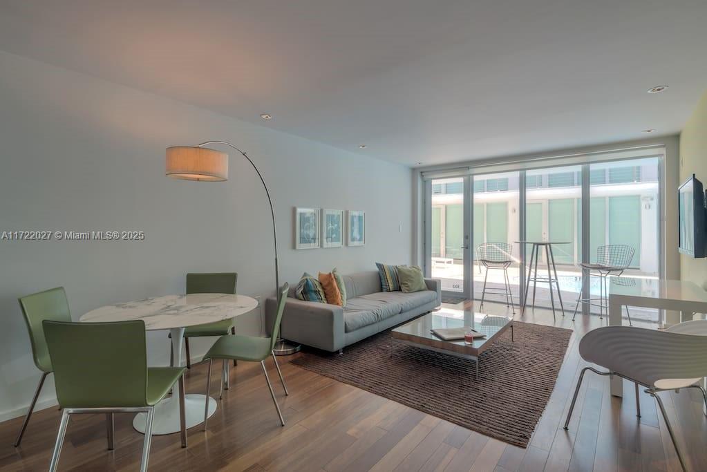 Iconic Mid-Century Gem in South Beach. This exquisite rental offers an unparalleled living experience in a peaceful and vibrant community features: beautiful wood flooring that exudes warmth and sophistication. Chef's Kitchen, sleek marble countertops and top-of-the-line appliances. Modern Bathrooms: Enjoy the convenience of one and a half bathrooms, complete with a bath and shower. In-Unit Laundry: Washer and dryer included for ultimate comfort and convenience. Swimming Poo, Assigned Parking. Nestled in one of the most serene communities on the beach, this apartment offers a tranquil retreat while being in close proximity to the vibrant South Beach lifestyle. Flexibal renal period