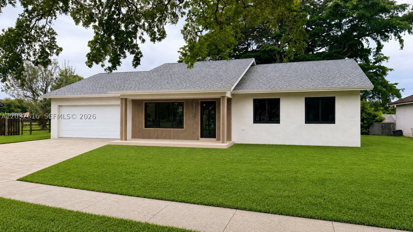 This exceptional LAKEFRONT home was extensively rebuilt and reimagined in 2026 with virtually every major component replaced. Taken down to the studs and renovated with quality craftsmanship and attention to detail with a modern flare.  This 3-bedroom, 2-bath home sits on an oversized 9,700+ sq. ft. lot with peaceful lake views, no rear neighbor, and NO HOA. Fully renovated with a modern 2026 design and completed with full architectural blueprints and approved renovation permits, Renovation features include a new 2026 ROOF, all IMPACT WINDOWS AND DOORS, NEW A/C, tankless water heater, updated electrical, updated plumbing, large-format porcelain tile throughout, new interior doors, fresh paint, LED lighting, and a sleek modern kitchen with new cabinetry, quartz countertops, and stainless-steel appliances. Both bathrooms have been completely redesigned with high-end contemporary finishes.  The large backyard offers excellent outdoor living potential with coved lanai and room for a pool.  Paver driveway under construction. Turnkey, modern, and rare for the area—this home delivers the feel of new construction in an established Cooper City neighborhood. All permitted and survey is provided.